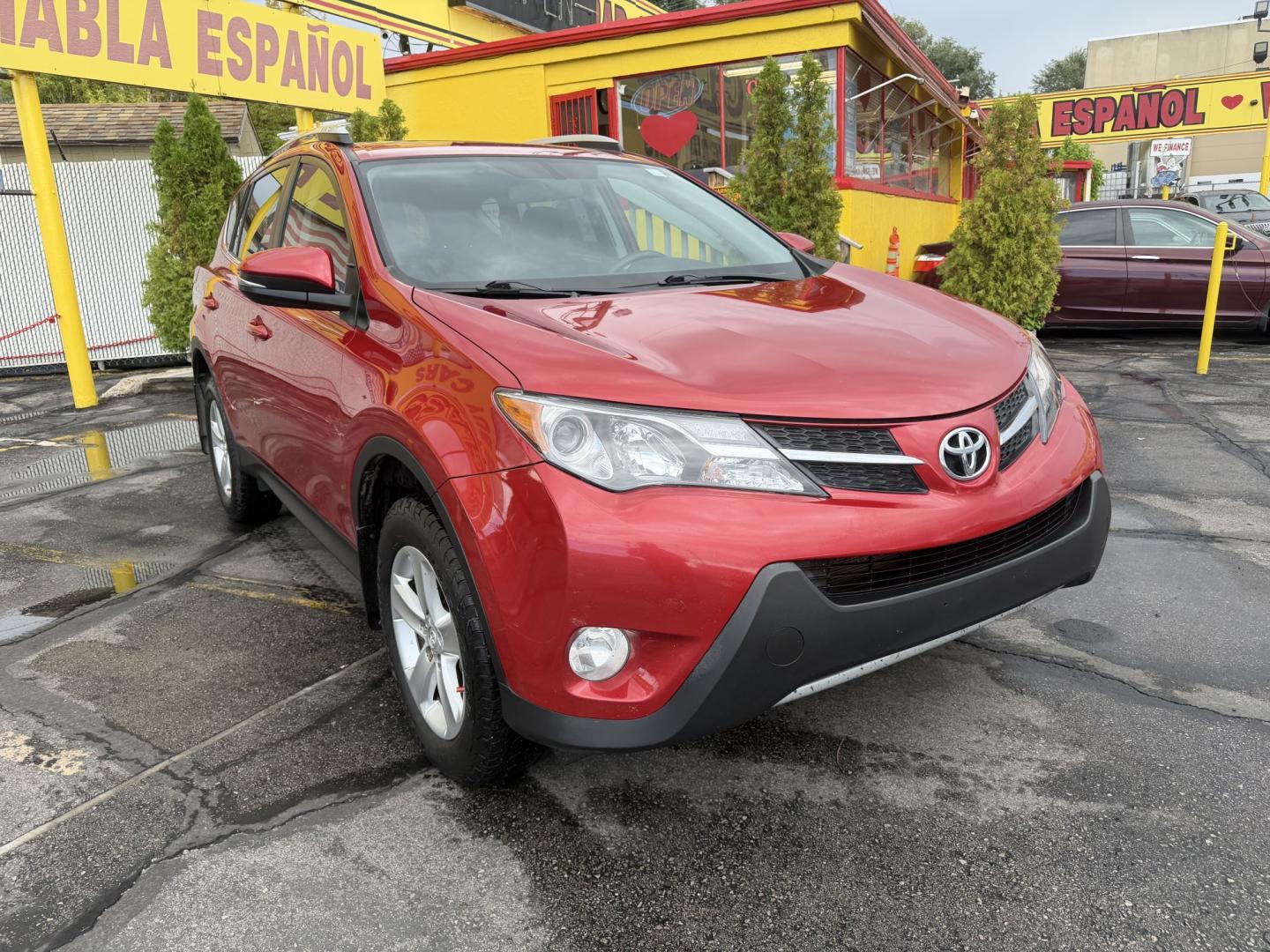 2013 Flame Red /BLACK Toyota RAV4 XLE AWD (2T3RFREV9DW) with an 2.5L L4 DOHC 16V engine, 6A transmission, located at 801 South State Street, Salt Lake City, UT, 84111, (801) 328-0098, 40.751953, -111.888206 - Clean title! Immaculate condition inside and out! Carfax shows no accidents this suv has been meticulously maintained and cared for and had regular oil changes and service performed over 35 service records reported to Carfax that show regular maintenance. Approved for up to a 5 year warranty that co- Photo#3
