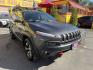 2016 Mineral Gray Metallic /Black Jeep Cherokee Trailhawk 4WD (1C4PJMBS6GW) with an 3.2L V6 DOHC 24V engine, 9A transmission, located at 801 South State Street, Salt Lake City, UT, 84111, (801) 328-0098, 40.751953, -111.888206 - Clean title no accidents on Carfax report! Perfect Jeep for winter great reliability and very good in the snow and 4x4 conditions! Includes the Trail Hawk package, roof rack and much more! Approved for up to a 5 year warranty that can be added at time of sale!!! Features: Automatic Transmission, 3.- Photo#2