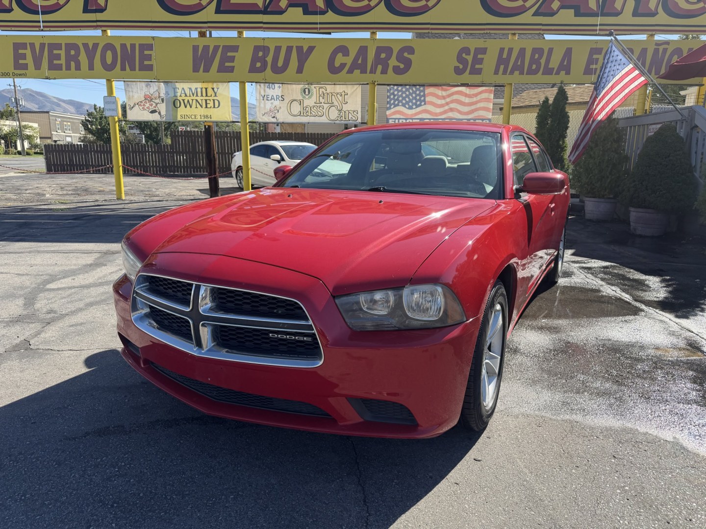 2012 Flame Red /Tan Dodge Charger SE (2C3CDXBG5CH) with an 3.6L V6 DOHC 24V engine, 5-Speed Automatic transmission, located at 801 South State Street, Salt Lake City, UT, 84111, (801) 328-0098, 40.751953, -111.888206 - Clean title! Carfax shows this vehicle has been meticulously cared for and maintained Carfax shows regular service was done and oil changes. This vehicle has passed all mechanical inspections and approved for up to a 5 year warranty that can be added at time of purchase! Features: Automatic, Alloy- Photo#1
