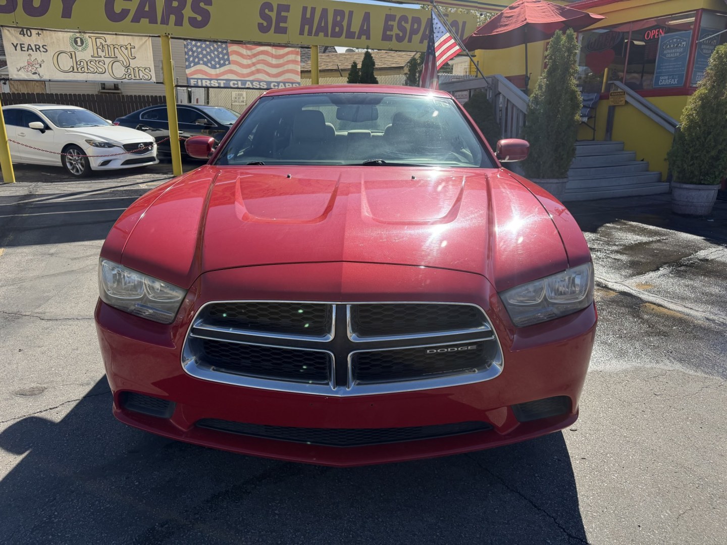 2012 Flame Red /Tan Dodge Charger SE (2C3CDXBG5CH) with an 3.6L V6 DOHC 24V engine, 5-Speed Automatic transmission, located at 801 South State Street, Salt Lake City, UT, 84111, (801) 328-0098, 40.751953, -111.888206 - Clean title! Carfax shows this vehicle has been meticulously cared for and maintained Carfax shows regular service was done and oil changes. This vehicle has passed all mechanical inspections and approved for up to a 5 year warranty that can be added at time of purchase! Features: Automatic, Alloy- Photo#2
