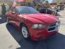 2012 Flame Red /Tan Dodge Charger SE (2C3CDXBG5CH) with an 3.6L V6 DOHC 24V engine, 5-Speed Automatic transmission, located at 801 South State Street, Salt Lake City, UT, 84111, (801) 328-0098, 40.751953, -111.888206 - Clean title! Carfax shows this vehicle has been meticulously cared for and maintained Carfax shows regular service was done and oil changes. This vehicle has passed all mechanical inspections and approved for up to a 5 year warranty that can be added at time of purchase! Features: Automatic, Alloy- Photo#3