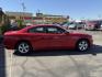 2012 Flame Red /Tan Dodge Charger SE (2C3CDXBG5CH) with an 3.6L V6 DOHC 24V engine, 5-Speed Automatic transmission, located at 801 South State Street, Salt Lake City, UT, 84111, (801) 328-0098, 40.751953, -111.888206 - Clean title! Carfax shows this vehicle has been meticulously cared for and maintained Carfax shows regular service was done and oil changes. This vehicle has passed all mechanical inspections and approved for up to a 5 year warranty that can be added at time of purchase! Features: Automatic, Alloy- Photo#5