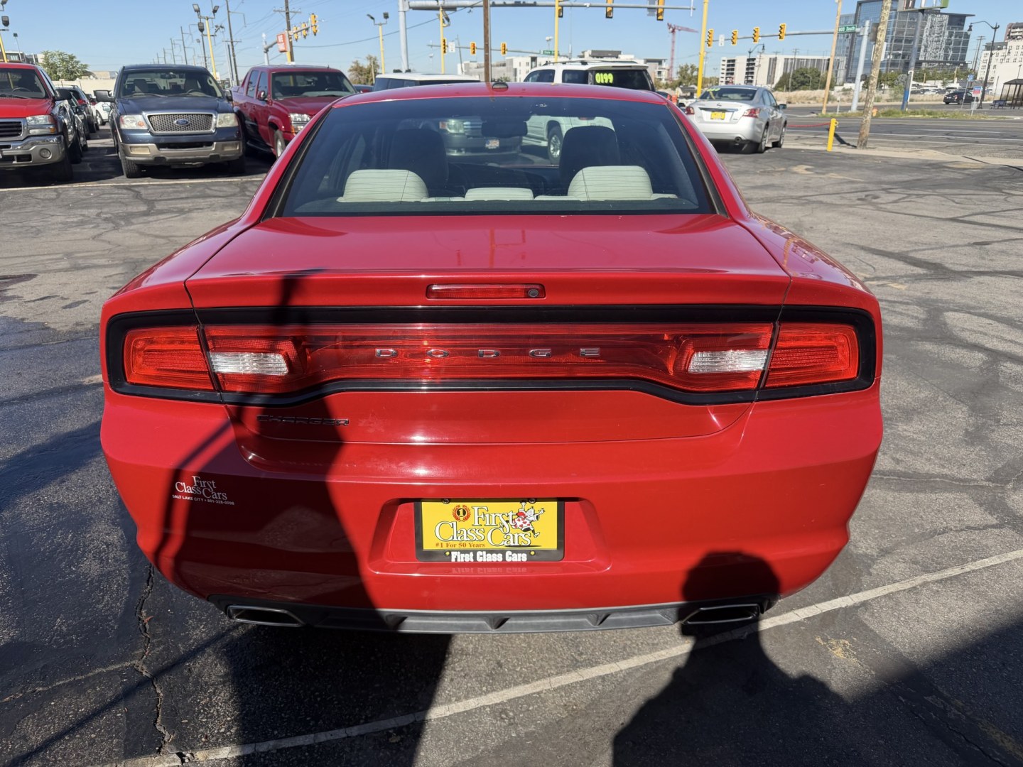 2012 Flame Red /Tan Dodge Charger SE (2C3CDXBG5CH) with an 3.6L V6 DOHC 24V engine, 5-Speed Automatic transmission, located at 801 South State Street, Salt Lake City, UT, 84111, (801) 328-0098, 40.751953, -111.888206 - Clean title! Carfax shows this vehicle has been meticulously cared for and maintained Carfax shows regular service was done and oil changes. This vehicle has passed all mechanical inspections and approved for up to a 5 year warranty that can be added at time of purchase! Features: Automatic, Alloy- Photo#7
