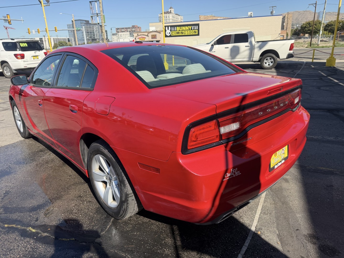 2012 Flame Red /Tan Dodge Charger SE (2C3CDXBG5CH) with an 3.6L V6 DOHC 24V engine, 5-Speed Automatic transmission, located at 801 South State Street, Salt Lake City, UT, 84111, (801) 328-0098, 40.751953, -111.888206 - Clean title! Carfax shows this vehicle has been meticulously cared for and maintained Carfax shows regular service was done and oil changes. This vehicle has passed all mechanical inspections and approved for up to a 5 year warranty that can be added at time of purchase! Features: Automatic, Alloy- Photo#8