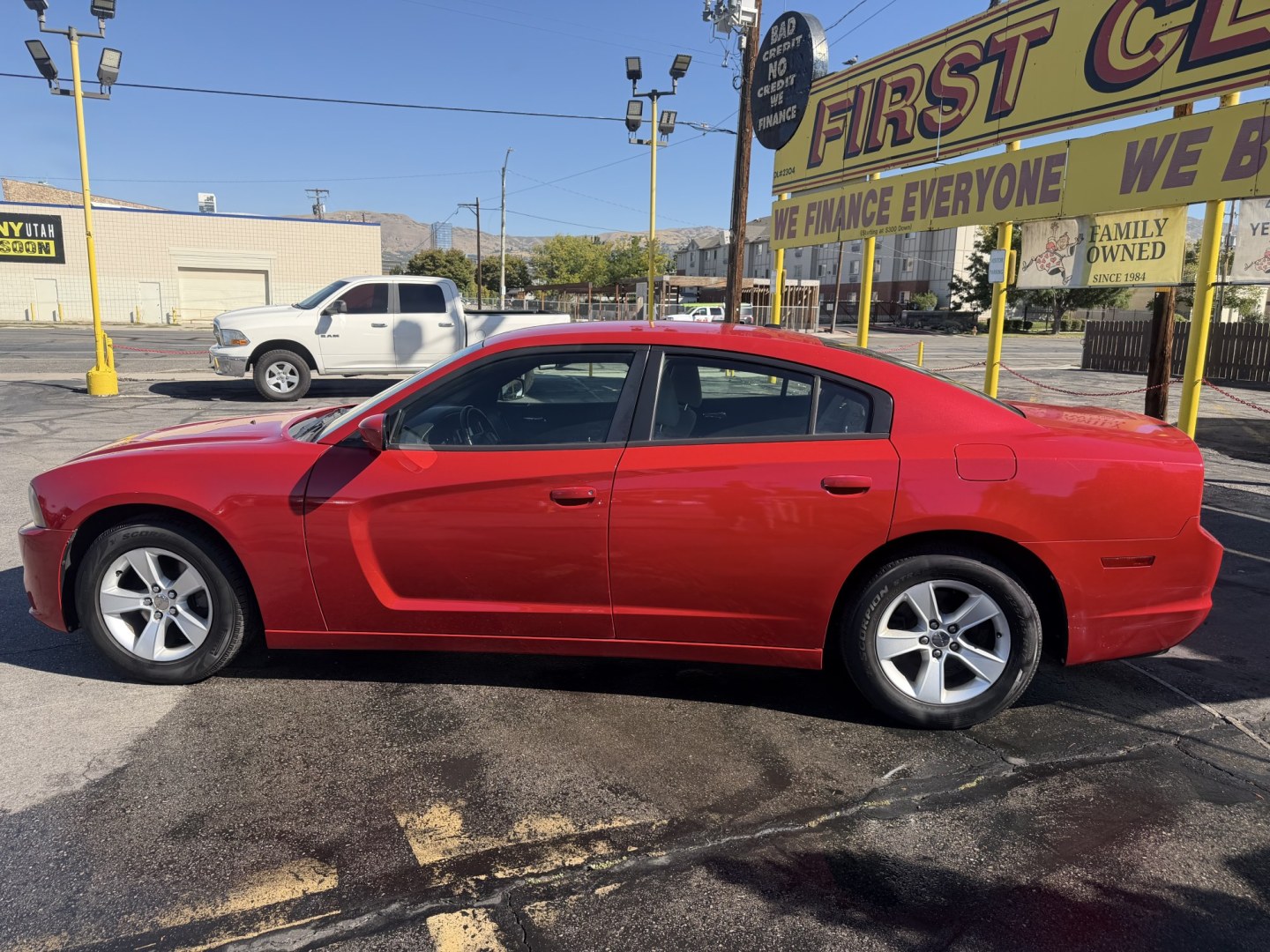 2012 Flame Red /Tan Dodge Charger SE (2C3CDXBG5CH) with an 3.6L V6 DOHC 24V engine, 5-Speed Automatic transmission, located at 801 South State Street, Salt Lake City, UT, 84111, (801) 328-0098, 40.751953, -111.888206 - Clean title! Carfax shows this vehicle has been meticulously cared for and maintained Carfax shows regular service was done and oil changes. This vehicle has passed all mechanical inspections and approved for up to a 5 year warranty that can be added at time of purchase! Features: Automatic, Alloy- Photo#9