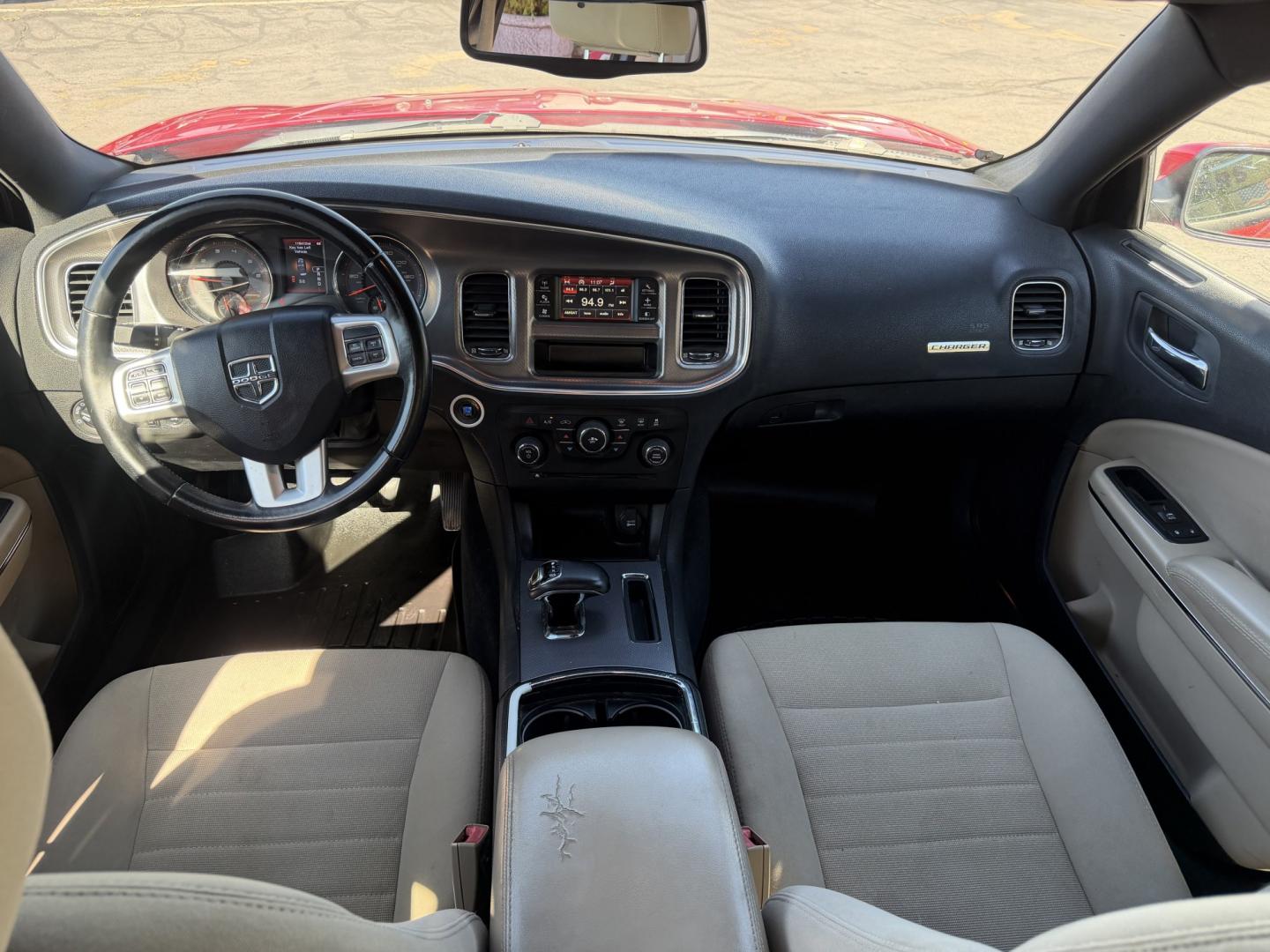 2012 Flame Red /Tan Dodge Charger SE (2C3CDXBG5CH) with an 3.6L V6 DOHC 24V engine, 5-Speed Automatic transmission, located at 801 South State Street, Salt Lake City, UT, 84111, (801) 328-0098, 40.751953, -111.888206 - Clean title! Carfax shows this vehicle has been meticulously cared for and maintained Carfax shows regular service was done and oil changes. This vehicle has passed all mechanical inspections and approved for up to a 5 year warranty that can be added at time of purchase! Features: Automatic, Alloy- Photo#13