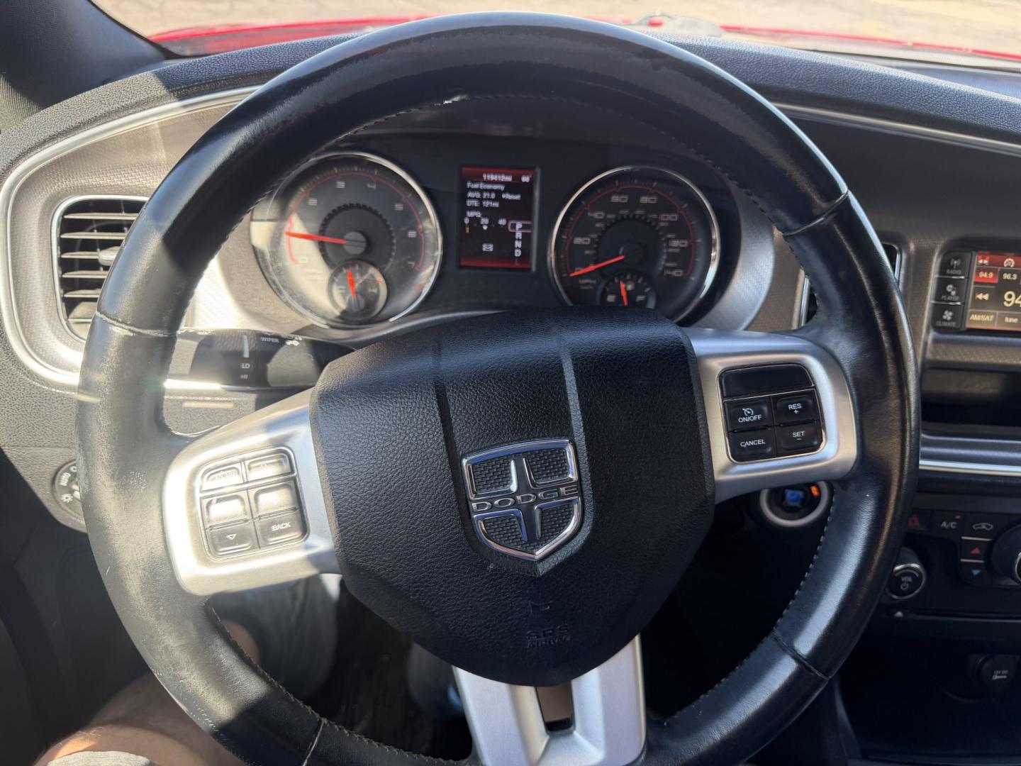 2012 Flame Red /Tan Dodge Charger SE (2C3CDXBG5CH) with an 3.6L V6 DOHC 24V engine, 5-Speed Automatic transmission, located at 801 South State Street, Salt Lake City, UT, 84111, (801) 328-0098, 40.751953, -111.888206 - Clean title! Carfax shows this vehicle has been meticulously cared for and maintained Carfax shows regular service was done and oil changes. This vehicle has passed all mechanical inspections and approved for up to a 5 year warranty that can be added at time of purchase! Features: Automatic, Alloy- Photo#21