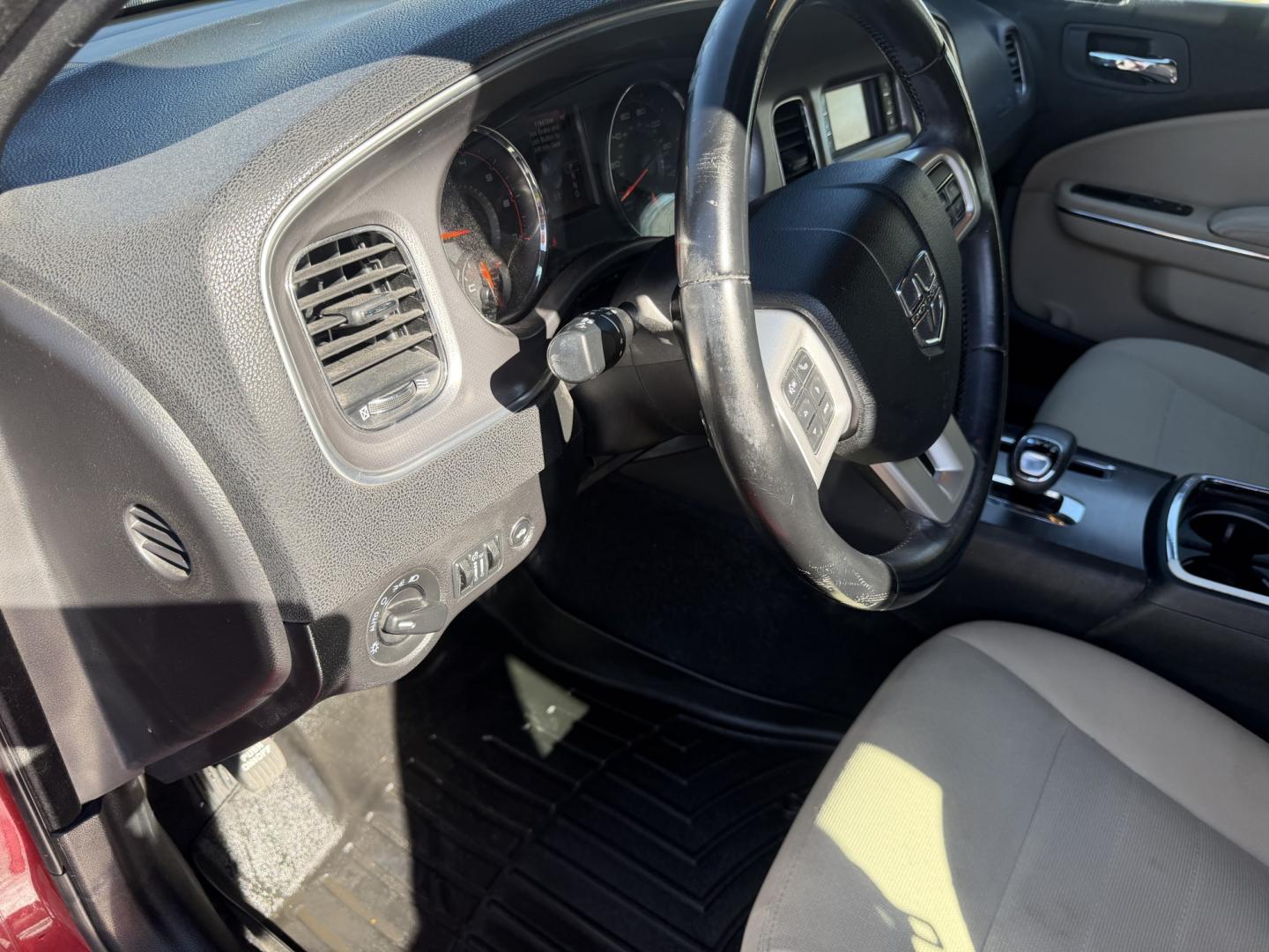 2012 Flame Red /Tan Dodge Charger SE (2C3CDXBG5CH) with an 3.6L V6 DOHC 24V engine, 5-Speed Automatic transmission, located at 801 South State Street, Salt Lake City, UT, 84111, (801) 328-0098, 40.751953, -111.888206 - Clean title! Carfax shows this vehicle has been meticulously cared for and maintained Carfax shows regular service was done and oil changes. This vehicle has passed all mechanical inspections and approved for up to a 5 year warranty that can be added at time of purchase! Features: Automatic, Alloy- Photo#22