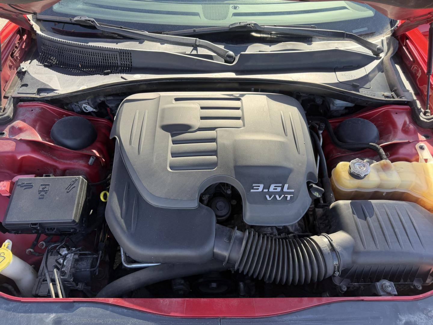 2012 Flame Red /Tan Dodge Charger SE (2C3CDXBG5CH) with an 3.6L V6 DOHC 24V engine, 5-Speed Automatic transmission, located at 801 South State Street, Salt Lake City, UT, 84111, (801) 328-0098, 40.751953, -111.888206 - Clean title! Carfax shows this vehicle has been meticulously cared for and maintained Carfax shows regular service was done and oil changes. This vehicle has passed all mechanical inspections and approved for up to a 5 year warranty that can be added at time of purchase! Features: Automatic, Alloy- Photo#24