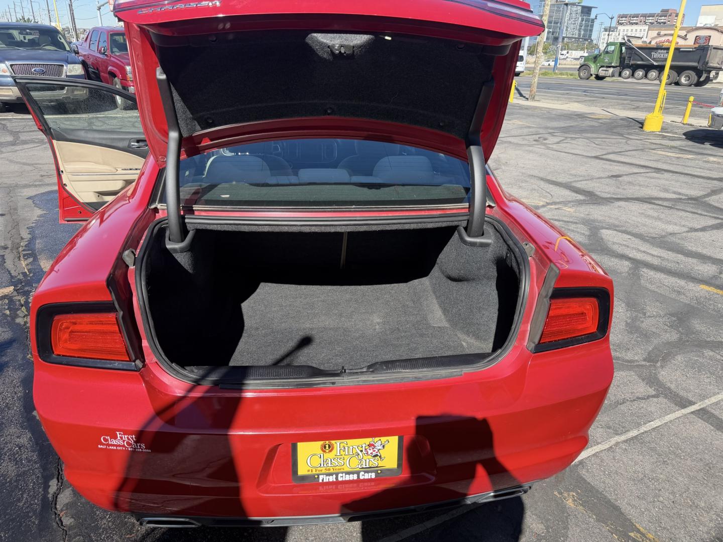 2012 Flame Red /Tan Dodge Charger SE (2C3CDXBG5CH) with an 3.6L V6 DOHC 24V engine, 5-Speed Automatic transmission, located at 801 South State Street, Salt Lake City, UT, 84111, (801) 328-0098, 40.751953, -111.888206 - Clean title! Carfax shows this vehicle has been meticulously cared for and maintained Carfax shows regular service was done and oil changes. This vehicle has passed all mechanical inspections and approved for up to a 5 year warranty that can be added at time of purchase! Features: Automatic, Alloy- Photo#25