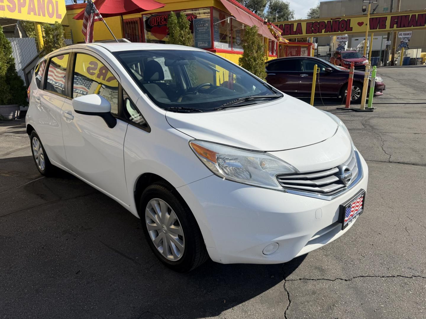 2016 Super White II /Black Nissan Versa Note S (3N1CE2CP4GL) with an 1.6L L4 DOHC 16V engine, 5M transmission, located at 801 South State Street, Salt Lake City, UT, 84111, (801) 328-0098, 40.751953, -111.888206 - Clean title! Low Miles! Great gas saver 35 MPG!!! Approved for up to a 5 year warranty that can be purchased at time of sale! Passed all mechanical inspections. Clean Carfax report only 2 previous owners on Carfax! Features: ABS Brakes, Air Conditioning, AM/FM Stereo, Automatic Transmission, Auxili- Photo#2