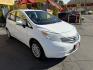 2016 Super White II /Black Nissan Versa Note S (3N1CE2CP4GL) with an 1.6L L4 DOHC 16V engine, 5M transmission, located at 801 South State Street, Salt Lake City, UT, 84111, (801) 328-0098, 40.751953, -111.888206 - Clean title! Low Miles! Great gas saver 35 MPG!!! Approved for up to a 5 year warranty that can be purchased at time of sale! Passed all mechanical inspections. Clean Carfax report only 2 previous owners on Carfax! Features: ABS Brakes, Air Conditioning, AM/FM Stereo, Automatic Transmission, Auxili- Photo#2