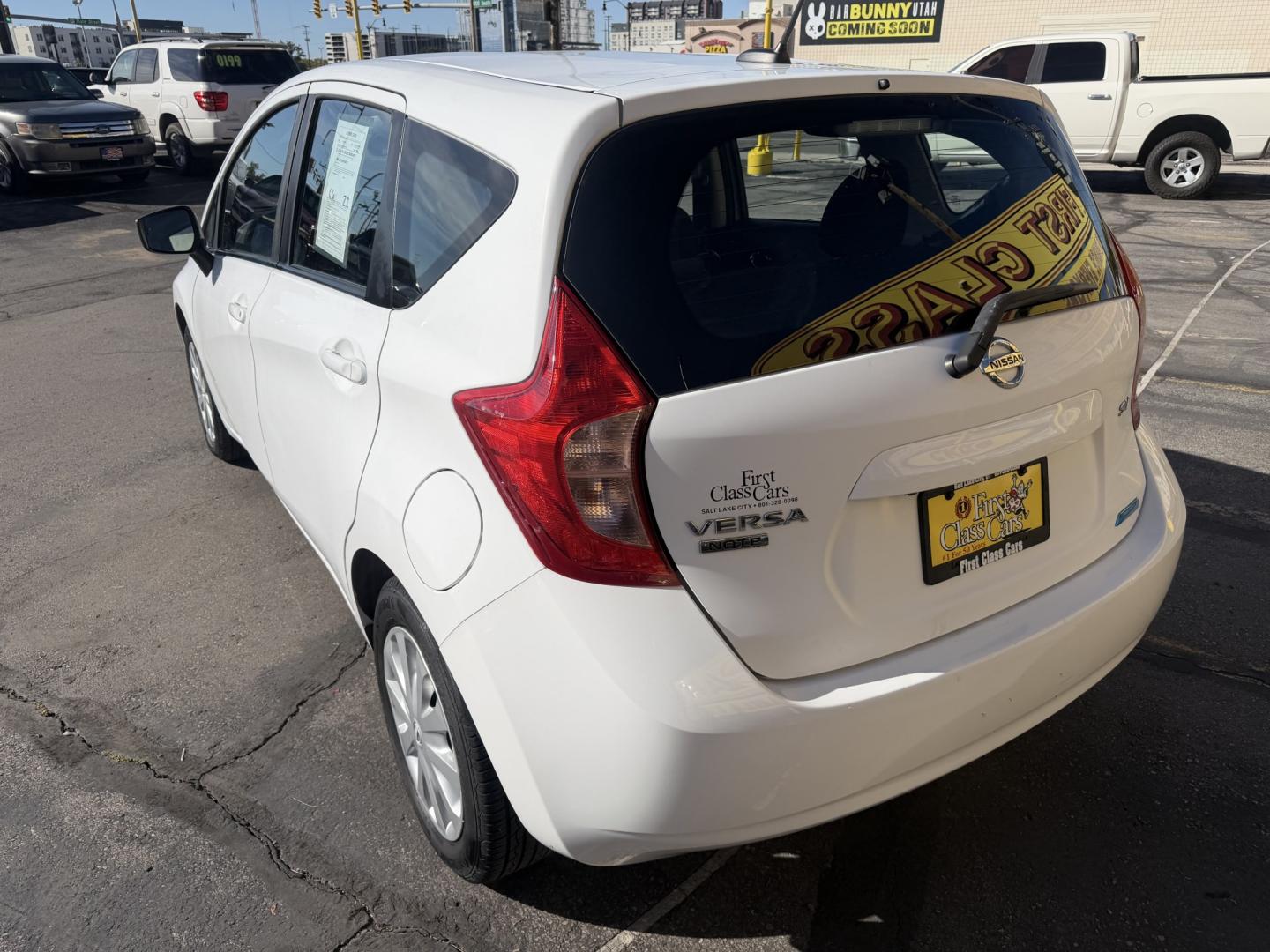 2016 Super White II /Black Nissan Versa Note S (3N1CE2CP4GL) with an 1.6L L4 DOHC 16V engine, 5M transmission, located at 801 South State Street, Salt Lake City, UT, 84111, (801) 328-0098, 40.751953, -111.888206 - Clean title! Low Miles! Great gas saver 35 MPG!!! Approved for up to a 5 year warranty that can be purchased at time of sale! Passed all mechanical inspections. Clean Carfax report only 2 previous owners on Carfax! Features: ABS Brakes, Air Conditioning, AM/FM Stereo, Automatic Transmission, Auxili- Photo#6