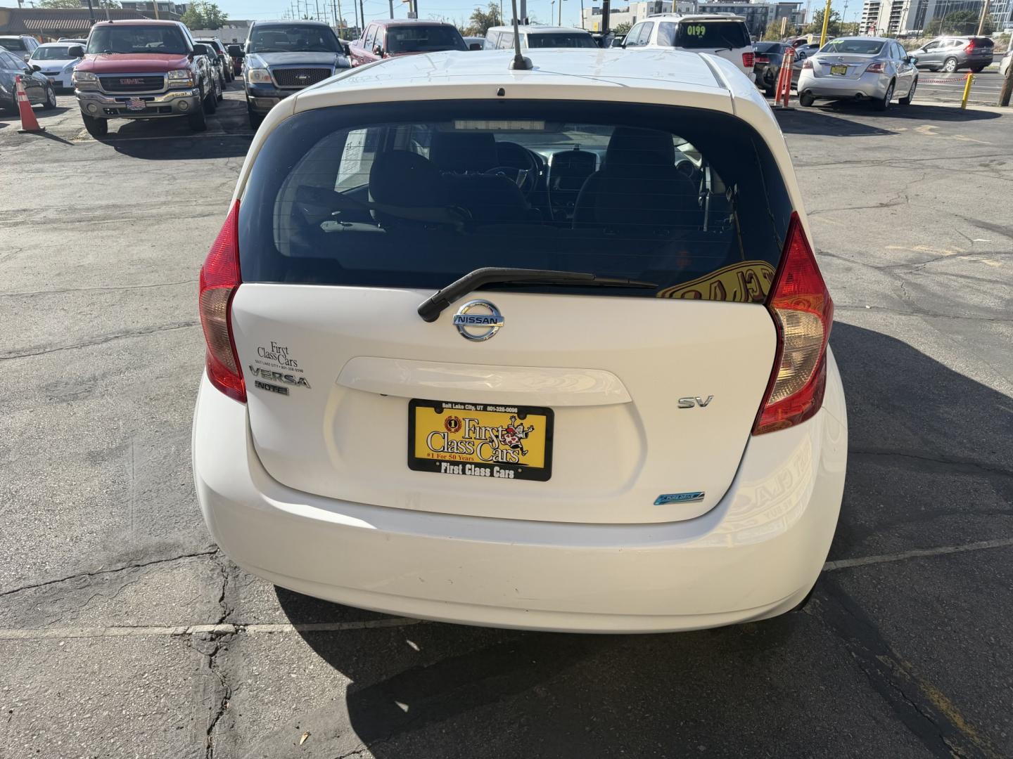 2016 Super White II /Black Nissan Versa Note S (3N1CE2CP4GL) with an 1.6L L4 DOHC 16V engine, 5M transmission, located at 801 South State Street, Salt Lake City, UT, 84111, (801) 328-0098, 40.751953, -111.888206 - Clean title! Low Miles! Great gas saver 35 MPG!!! Approved for up to a 5 year warranty that can be purchased at time of sale! Passed all mechanical inspections. Clean Carfax report only 2 previous owners on Carfax! Features: ABS Brakes, Air Conditioning, AM/FM Stereo, Automatic Transmission, Auxili- Photo#5