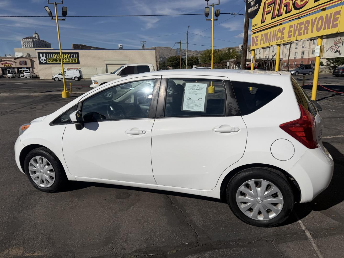 2016 Super White II /Black Nissan Versa Note S (3N1CE2CP4GL) with an 1.6L L4 DOHC 16V engine, 5M transmission, located at 801 South State Street, Salt Lake City, UT, 84111, (801) 328-0098, 40.751953, -111.888206 - Clean title! Low Miles! Great gas saver 35 MPG!!! Approved for up to a 5 year warranty that can be purchased at time of sale! Passed all mechanical inspections. Clean Carfax report only 2 previous owners on Carfax! Features: ABS Brakes, Air Conditioning, AM/FM Stereo, Automatic Transmission, Auxili- Photo#7