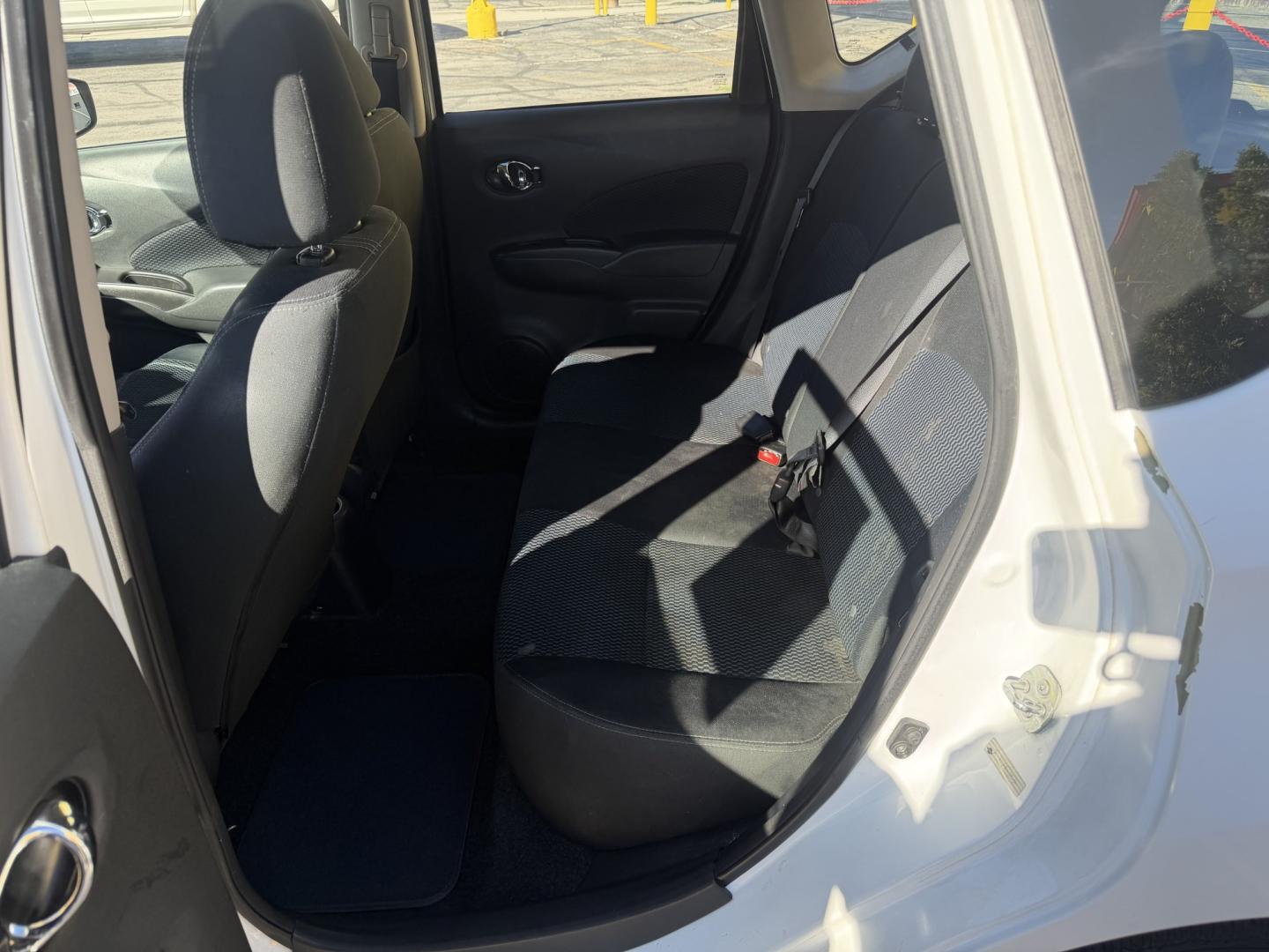2016 Super White II /Black Nissan Versa Note S (3N1CE2CP4GL) with an 1.6L L4 DOHC 16V engine, 5M transmission, located at 801 South State Street, Salt Lake City, UT, 84111, (801) 328-0098, 40.751953, -111.888206 - Clean title! Low Miles! Great gas saver 35 MPG!!! Approved for up to a 5 year warranty that can be purchased at time of sale! Passed all mechanical inspections. Clean Carfax report only 2 previous owners on Carfax! Features: ABS Brakes, Air Conditioning, AM/FM Stereo, Automatic Transmission, Auxili- Photo#11