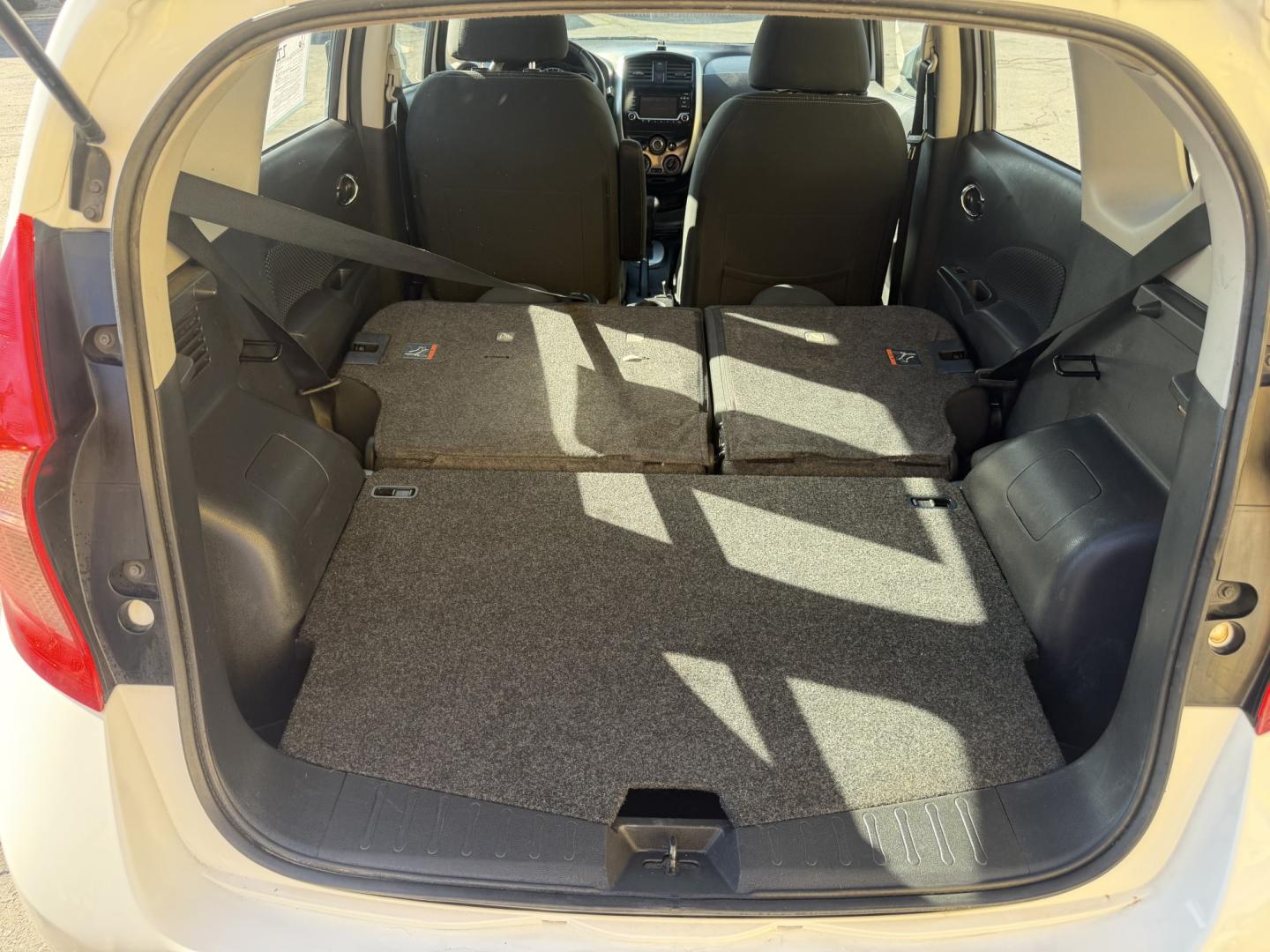 2016 Super White II /Black Nissan Versa Note S (3N1CE2CP4GL) with an 1.6L L4 DOHC 16V engine, 5M transmission, located at 801 South State Street, Salt Lake City, UT, 84111, (801) 328-0098, 40.751953, -111.888206 - Clean title! Low Miles! Great gas saver 35 MPG!!! Approved for up to a 5 year warranty that can be purchased at time of sale! Passed all mechanical inspections. Clean Carfax report only 2 previous owners on Carfax! Features: ABS Brakes, Air Conditioning, AM/FM Stereo, Automatic Transmission, Auxili- Photo#25