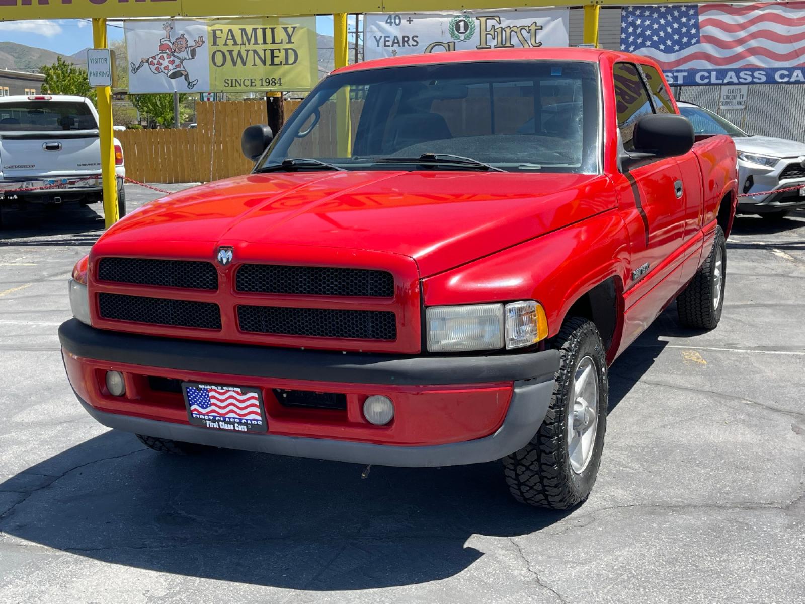 1998 Flame Red /Gray Cloth Dodge Ram 1500 Sport Quad Cab (3B7HC13Y4WG) with an 5.2L V8 engine, Automatic transmission, located at 801 South State Street, Salt Lake City, UT, 84111, (801) 328-0098, 40.751953, -111.888206 - Life is crazy. Now is the time to buy! All of our prices are just dollars above our cost. These prices will change as soon as life isn't so crazy. So please call or come in. We are here to save you a lot of money! Our service department is OPEN DAILY to help with any of your service need - Photo #2