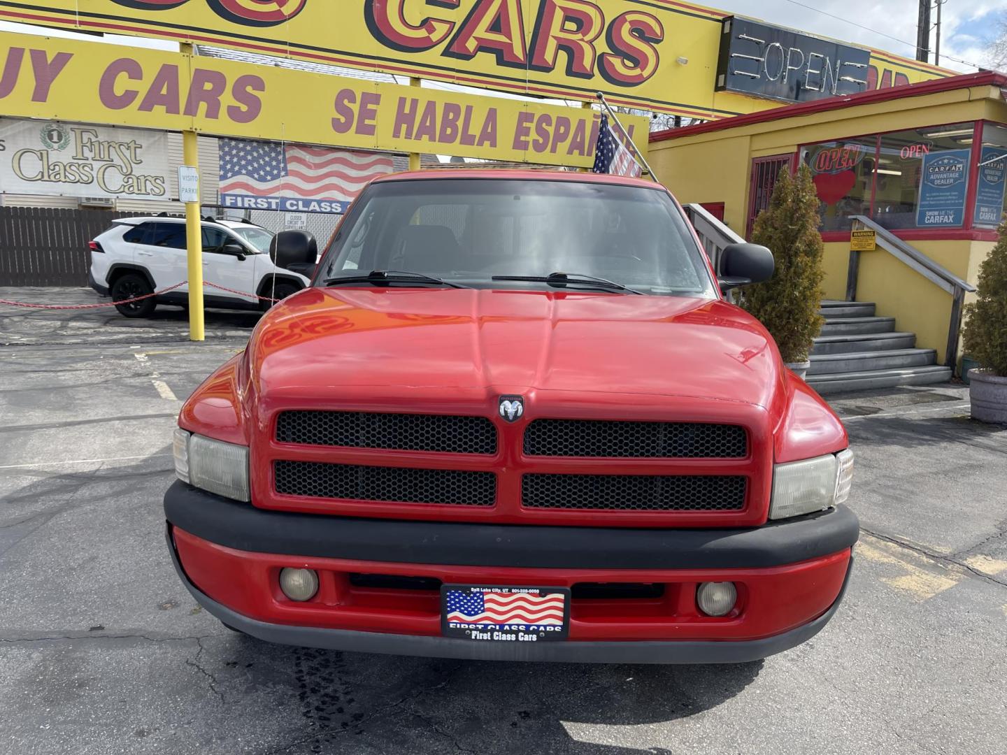 1998 Flame Red /Gray Cloth Dodge Ram 1500 Sport Quad Cab (3B7HC13Y4WG) with an 5.2L V8 engine, Automatic transmission, located at 801 South State Street, Salt Lake City, UT, 84111, (801) 328-0098, 40.751953, -111.888206 - Vehicle Features:Sport Model, Club Cab 4 Door, 5.2L V8, 6 Passenger Seating, Automatic Transmission, ABS Brakes, Cruise Control, Air Conditioning, AM-FM Stereo, CD Player, AUX Audio Input, Power Windows, Power Locks, Power Mirrors, Privacy Glass, Alloy Wheels Our service department is OPEN DAILY to - Photo#2