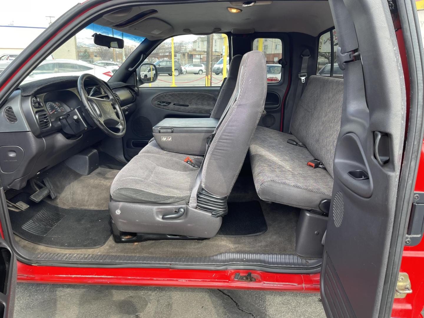 1998 Flame Red /Gray Cloth Dodge Ram 1500 Sport Quad Cab (3B7HC13Y4WG) with an 5.2L V8 engine, Automatic transmission, located at 801 South State Street, Salt Lake City, UT, 84111, (801) 328-0098, 40.751953, -111.888206 - Vehicle Features:Sport Model, Club Cab 4 Door, 5.2L V8, 6 Passenger Seating, Automatic Transmission, ABS Brakes, Cruise Control, Air Conditioning, AM-FM Stereo, CD Player, AUX Audio Input, Power Windows, Power Locks, Power Mirrors, Privacy Glass, Alloy Wheels Our service department is OPEN DAILY to - Photo#11