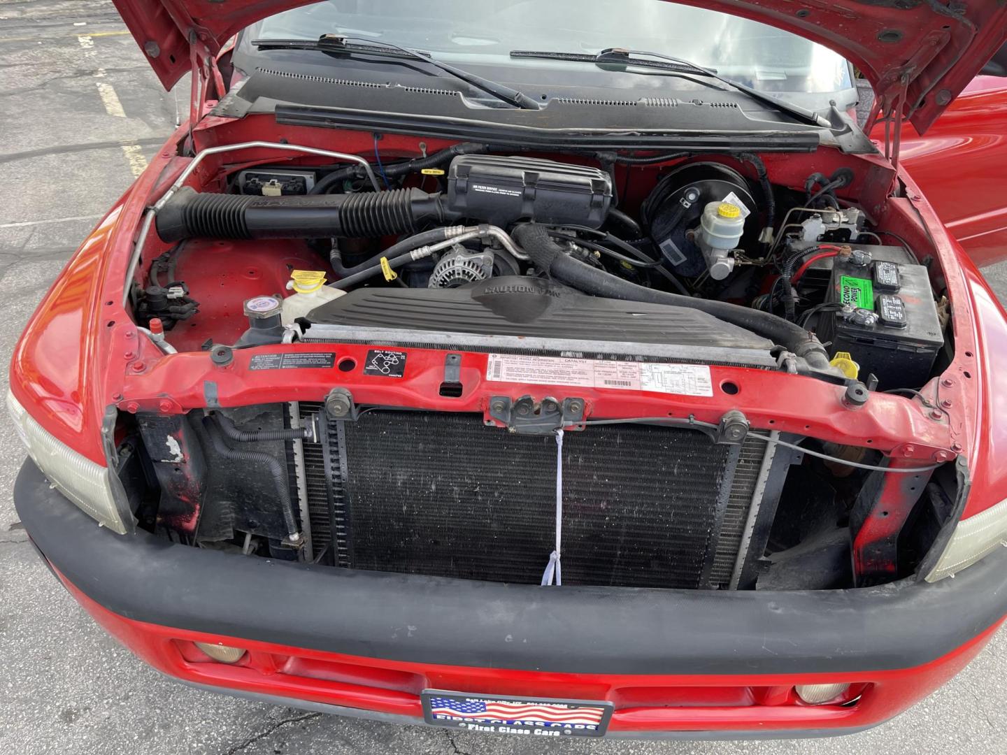 1998 Flame Red /Gray Cloth Dodge Ram 1500 Sport Quad Cab (3B7HC13Y4WG) with an 5.2L V8 engine, Automatic transmission, located at 801 South State Street, Salt Lake City, UT, 84111, (801) 328-0098, 40.751953, -111.888206 - Vehicle Features:Sport Model, Club Cab 4 Door, 5.2L V8, 6 Passenger Seating, Automatic Transmission, ABS Brakes, Cruise Control, Air Conditioning, AM-FM Stereo, CD Player, AUX Audio Input, Power Windows, Power Locks, Power Mirrors, Privacy Glass, Alloy Wheels Our service department is OPEN DAILY to - Photo#15