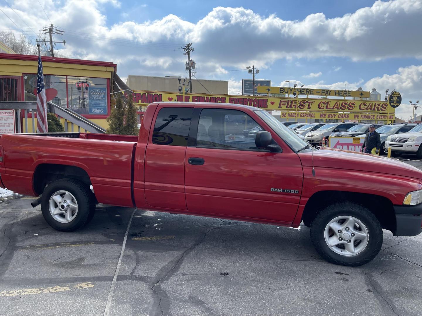 1998 Flame Red /Gray Cloth Dodge Ram 1500 Sport Quad Cab (3B7HC13Y4WG) with an 5.2L V8 engine, Automatic transmission, located at 801 South State Street, Salt Lake City, UT, 84111, (801) 328-0098, 40.751953, -111.888206 - Vehicle Features:Sport Model, Club Cab 4 Door, 5.2L V8, 6 Passenger Seating, Automatic Transmission, ABS Brakes, Cruise Control, Air Conditioning, AM-FM Stereo, CD Player, AUX Audio Input, Power Windows, Power Locks, Power Mirrors, Privacy Glass, Alloy Wheels Our service department is OPEN DAILY to - Photo#4