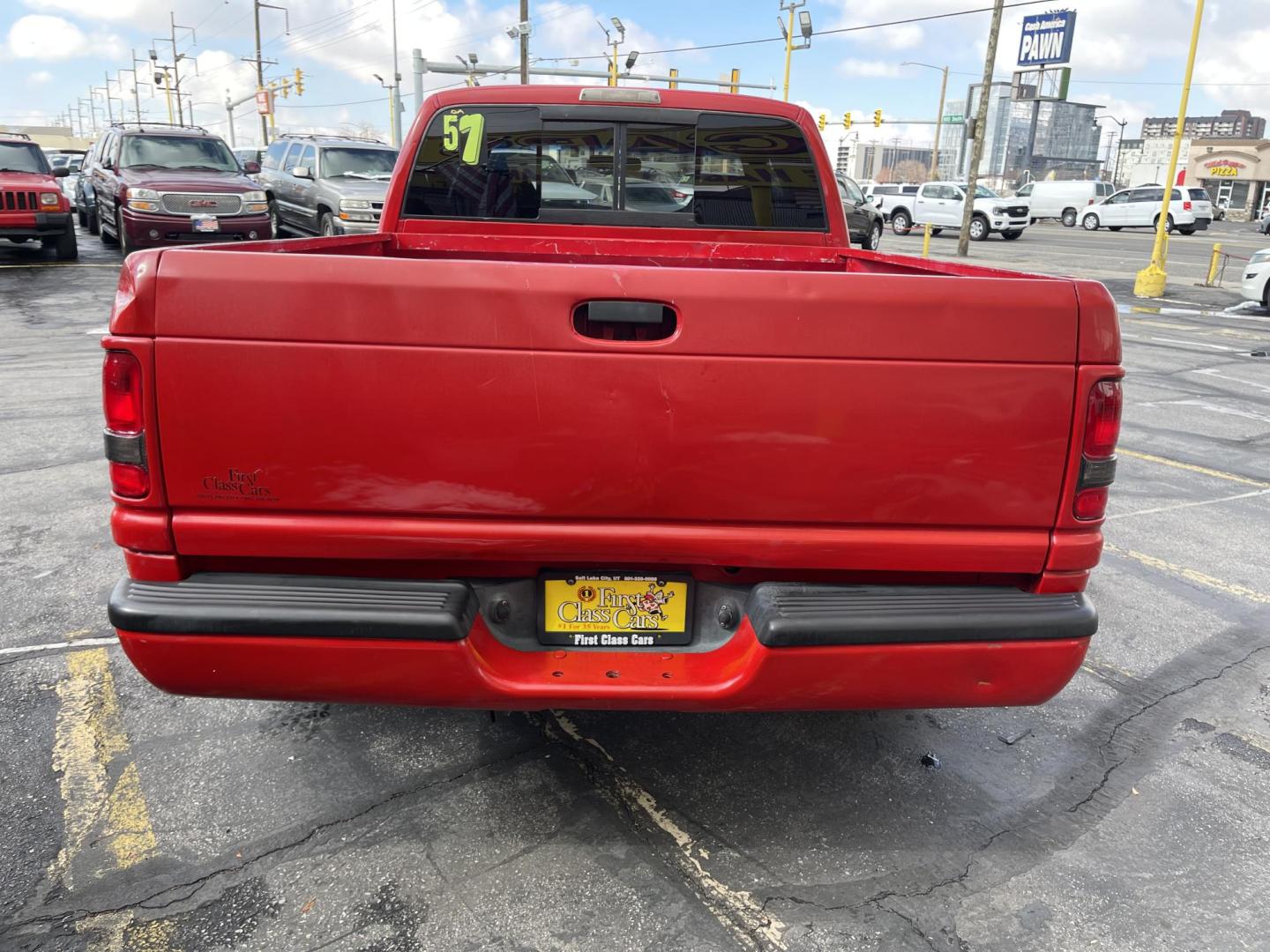 1998 Flame Red /Gray Cloth Dodge Ram 1500 Sport Quad Cab (3B7HC13Y4WG) with an 5.2L V8 engine, Automatic transmission, located at 801 South State Street, Salt Lake City, UT, 84111, (801) 328-0098, 40.751953, -111.888206 - Vehicle Features:Sport Model, Club Cab 4 Door, 5.2L V8, 6 Passenger Seating, Automatic Transmission, ABS Brakes, Cruise Control, Air Conditioning, AM-FM Stereo, CD Player, AUX Audio Input, Power Windows, Power Locks, Power Mirrors, Privacy Glass, Alloy Wheels Our service department is OPEN DAILY to - Photo#8