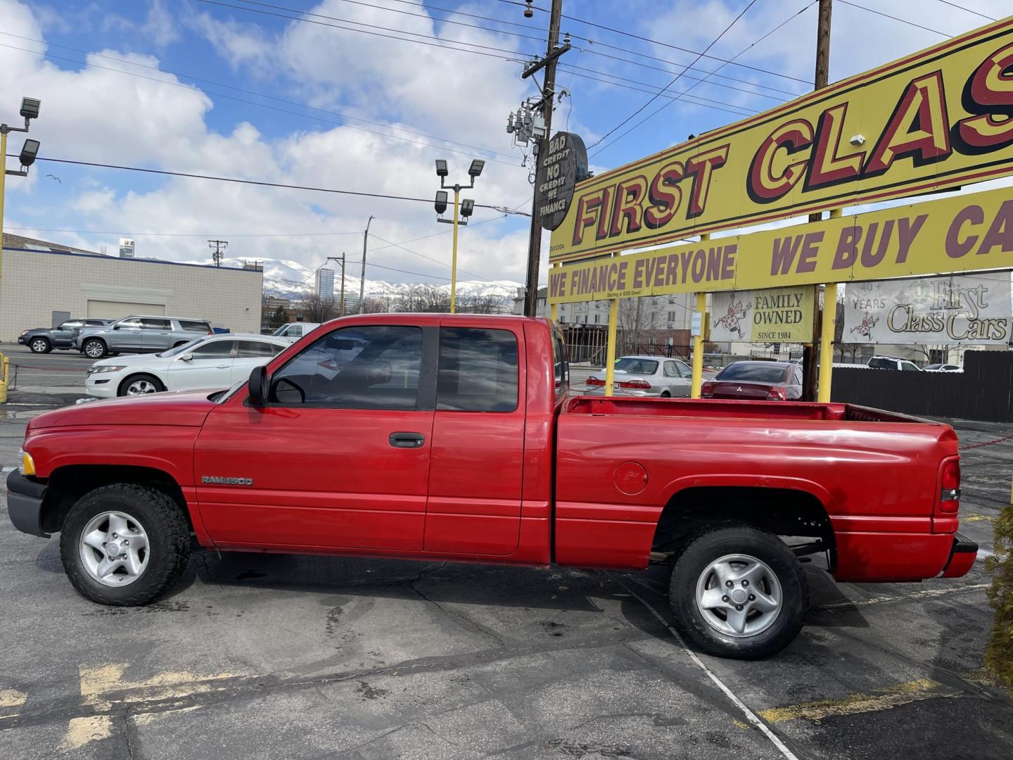 1998 Flame Red /Gray Cloth Dodge Ram 1500 Sport Quad Cab (3B7HC13Y4WG) with an 5.2L V8 engine, Automatic transmission, located at 801 South State Street, Salt Lake City, UT, 84111, (801) 328-0098, 40.751953, -111.888206 - Vehicle Features:Sport Model, Club Cab 4 Door, 5.2L V8, 6 Passenger Seating, Automatic Transmission, ABS Brakes, Cruise Control, Air Conditioning, AM-FM Stereo, CD Player, AUX Audio Input, Power Windows, Power Locks, Power Mirrors, Privacy Glass, Alloy Wheels Our service department is OPEN DAILY to - Photo#6