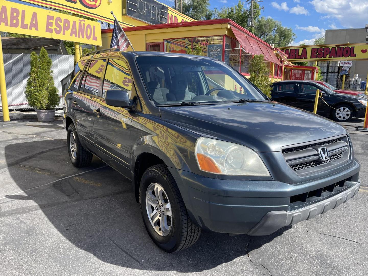 2003 Sagebrush Pearl /Gray Cloth Honda Pilot EX (2HKYF184X3H) with an 3.5L V6 engine, Automatic transmission, located at 801 South State Street, Salt Lake City, UT, 84111, (801) 328-0098, 40.751953, -111.888206 - 3rd row seating! 4x4! Clean title!!! Vehicle Features: EX Model, 3rd Rear Seat, 4WD-AWD, ABS Brakes, Air Conditioning, Alloy Wheels, AM-FM Stereo, Automatic Transmission, Cassette Player, CD Audio, Cloth Seats, Cruise Control, Fold-Away Third Row, Power Locks, Power Mirrors, Power Seat(s), Power W - Photo#3