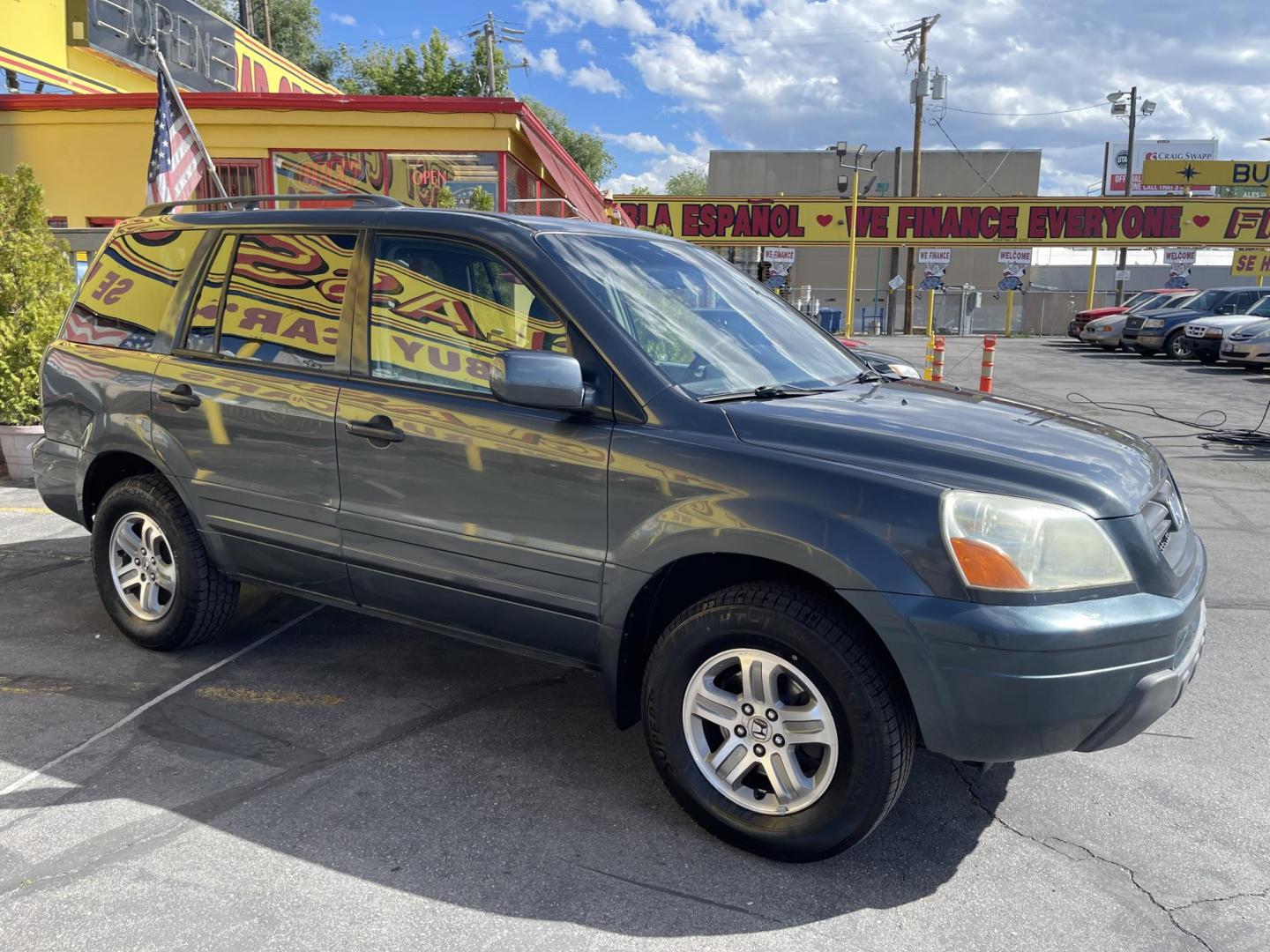2003 Sagebrush Pearl /Gray Cloth Honda Pilot EX (2HKYF184X3H) with an 3.5L V6 engine, Automatic transmission, located at 801 South State Street, Salt Lake City, UT, 84111, (801) 328-0098, 40.751953, -111.888206 - 3rd row seating! 4x4! Clean title!!! Vehicle Features: EX Model, 3rd Rear Seat, 4WD-AWD, ABS Brakes, Air Conditioning, Alloy Wheels, AM-FM Stereo, Automatic Transmission, Cassette Player, CD Audio, Cloth Seats, Cruise Control, Fold-Away Third Row, Power Locks, Power Mirrors, Power Seat(s), Power W - Photo#4