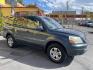 2003 Sagebrush Pearl /Gray Cloth Honda Pilot EX (2HKYF184X3H) with an 3.5L V6 engine, Automatic transmission, located at 801 South State Street, Salt Lake City, UT, 84111, (801) 328-0098, 40.751953, -111.888206 - 3rd row seating! 4x4! Clean title!!! Vehicle Features: EX Model, 3rd Rear Seat, 4WD-AWD, ABS Brakes, Air Conditioning, Alloy Wheels, AM-FM Stereo, Automatic Transmission, Cassette Player, CD Audio, Cloth Seats, Cruise Control, Fold-Away Third Row, Power Locks, Power Mirrors, Power Seat(s), Power W - Photo#4