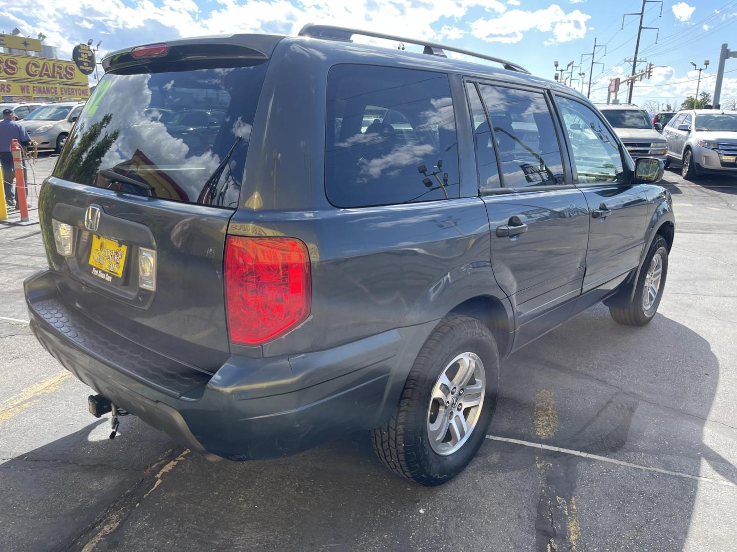 2003 Sagebrush Pearl /Gray Cloth Honda Pilot EX (2HKYF184X3H) with an 3.5L V6 engine, Automatic transmission, located at 801 South State Street, Salt Lake City, UT, 84111, (801) 328-0098, 40.751953, -111.888206 - 3rd row seating! 4x4! Clean title!!! Vehicle Features: EX Model, 3rd Rear Seat, 4WD-AWD, ABS Brakes, Air Conditioning, Alloy Wheels, AM-FM Stereo, Automatic Transmission, Cassette Player, CD Audio, Cloth Seats, Cruise Control, Fold-Away Third Row, Power Locks, Power Mirrors, Power Seat(s), Power W - Photo#5