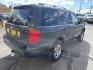 2003 Sagebrush Pearl /Gray Cloth Honda Pilot EX (2HKYF184X3H) with an 3.5L V6 engine, Automatic transmission, located at 801 South State Street, Salt Lake City, UT, 84111, (801) 328-0098, 40.751953, -111.888206 - 3rd row seating! 4x4! Clean title!!! Vehicle Features: EX Model, 3rd Rear Seat, 4WD-AWD, ABS Brakes, Air Conditioning, Alloy Wheels, AM-FM Stereo, Automatic Transmission, Cassette Player, CD Audio, Cloth Seats, Cruise Control, Fold-Away Third Row, Power Locks, Power Mirrors, Power Seat(s), Power W - Photo#5
