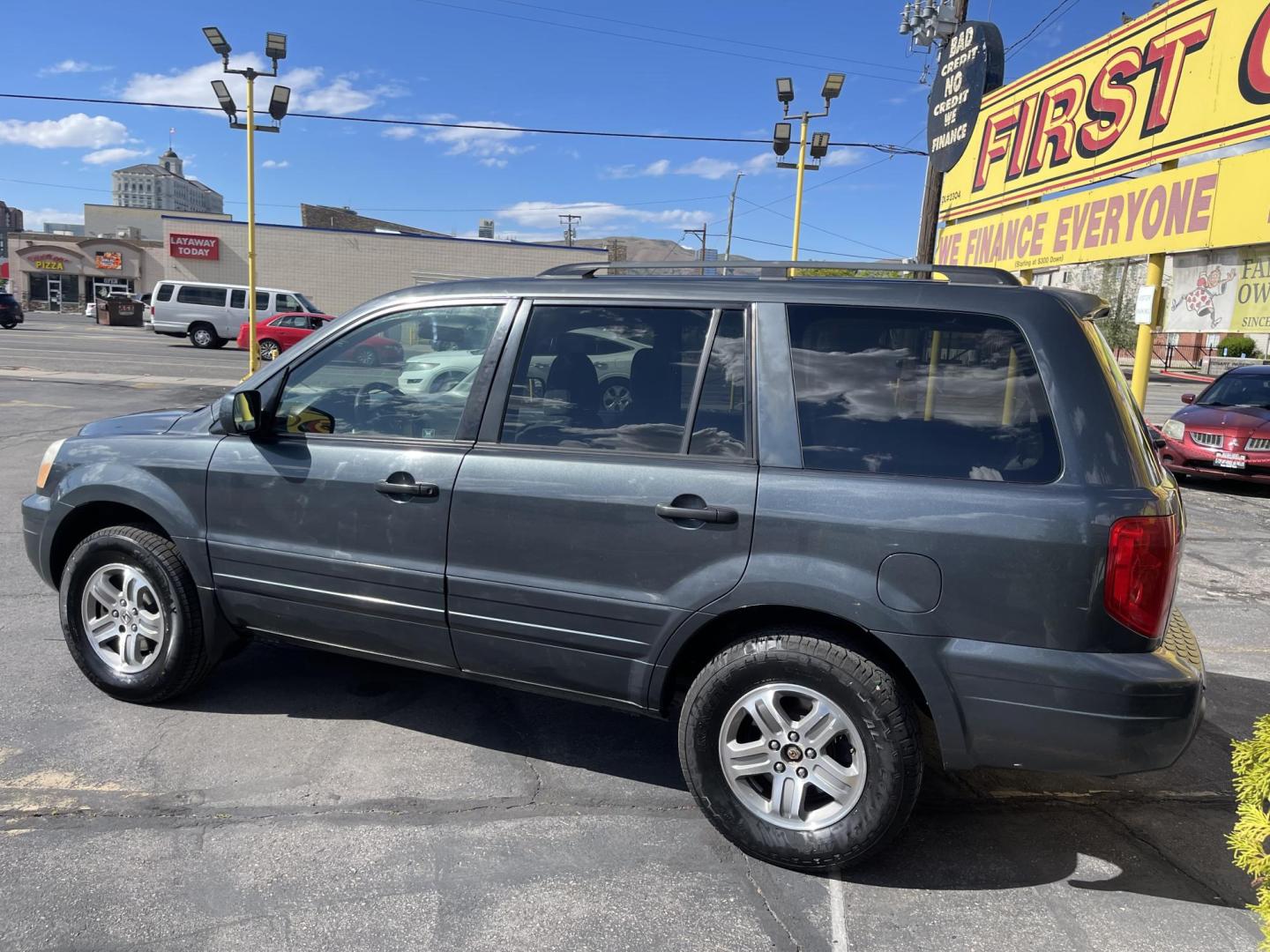 2003 Sagebrush Pearl /Gray Cloth Honda Pilot EX (2HKYF184X3H) with an 3.5L V6 engine, Automatic transmission, located at 801 South State Street, Salt Lake City, UT, 84111, (801) 328-0098, 40.751953, -111.888206 - 3rd row seating! 4x4! Clean title!!! Vehicle Features: EX Model, 3rd Rear Seat, 4WD-AWD, ABS Brakes, Air Conditioning, Alloy Wheels, AM-FM Stereo, Automatic Transmission, Cassette Player, CD Audio, Cloth Seats, Cruise Control, Fold-Away Third Row, Power Locks, Power Mirrors, Power Seat(s), Power W - Photo#7