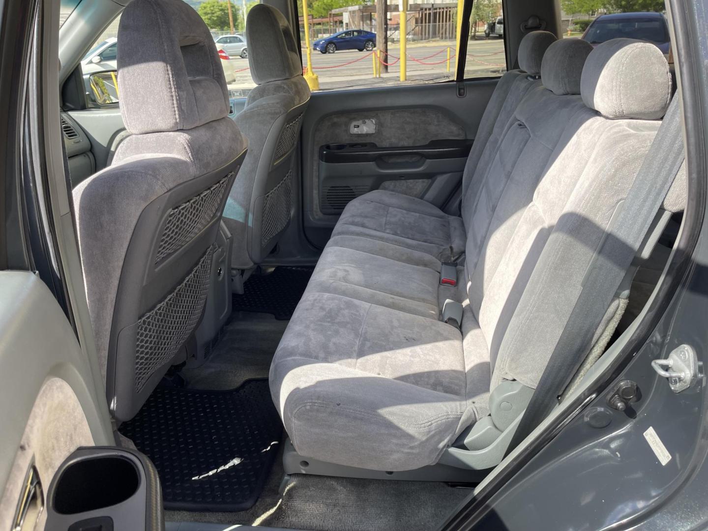 2003 Sagebrush Pearl /Gray Cloth Honda Pilot EX (2HKYF184X3H) with an 3.5L V6 engine, Automatic transmission, located at 801 South State Street, Salt Lake City, UT, 84111, (801) 328-0098, 40.751953, -111.888206 - 3rd row seating! 4x4! Clean title!!! Vehicle Features: EX Model, 3rd Rear Seat, 4WD-AWD, ABS Brakes, Air Conditioning, Alloy Wheels, AM-FM Stereo, Automatic Transmission, Cassette Player, CD Audio, Cloth Seats, Cruise Control, Fold-Away Third Row, Power Locks, Power Mirrors, Power Seat(s), Power W - Photo#11