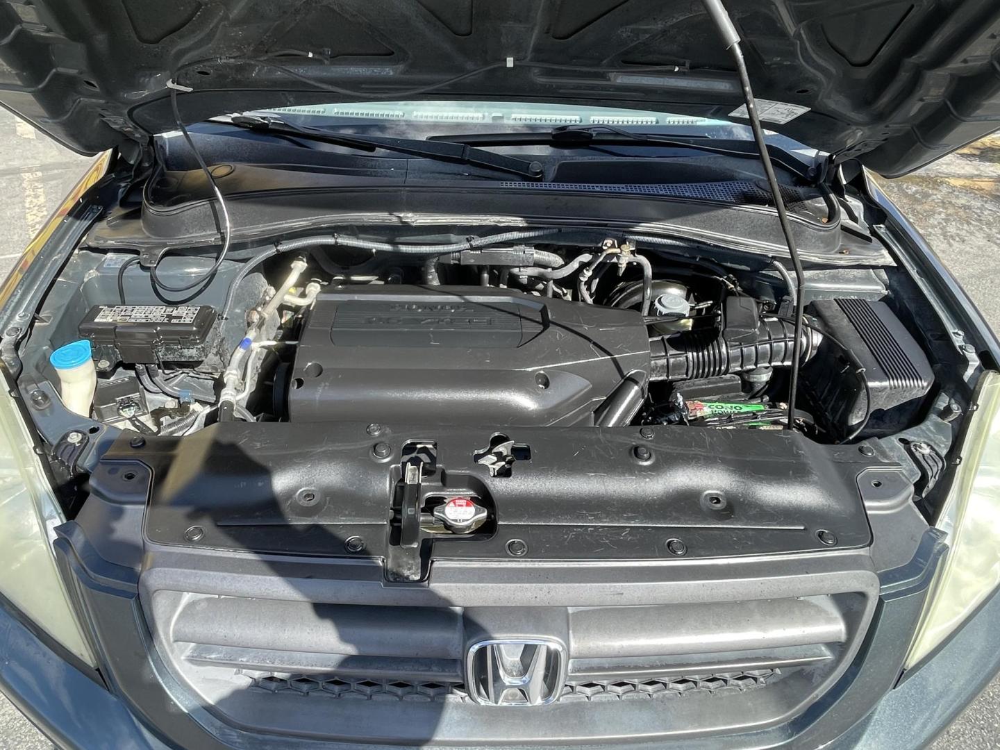 2003 Sagebrush Pearl /Gray Cloth Honda Pilot EX (2HKYF184X3H) with an 3.5L V6 engine, Automatic transmission, located at 801 South State Street, Salt Lake City, UT, 84111, (801) 328-0098, 40.751953, -111.888206 - 3rd row seating! 4x4! Clean title!!! Vehicle Features: EX Model, 3rd Rear Seat, 4WD-AWD, ABS Brakes, Air Conditioning, Alloy Wheels, AM-FM Stereo, Automatic Transmission, Cassette Player, CD Audio, Cloth Seats, Cruise Control, Fold-Away Third Row, Power Locks, Power Mirrors, Power Seat(s), Power W - Photo#17