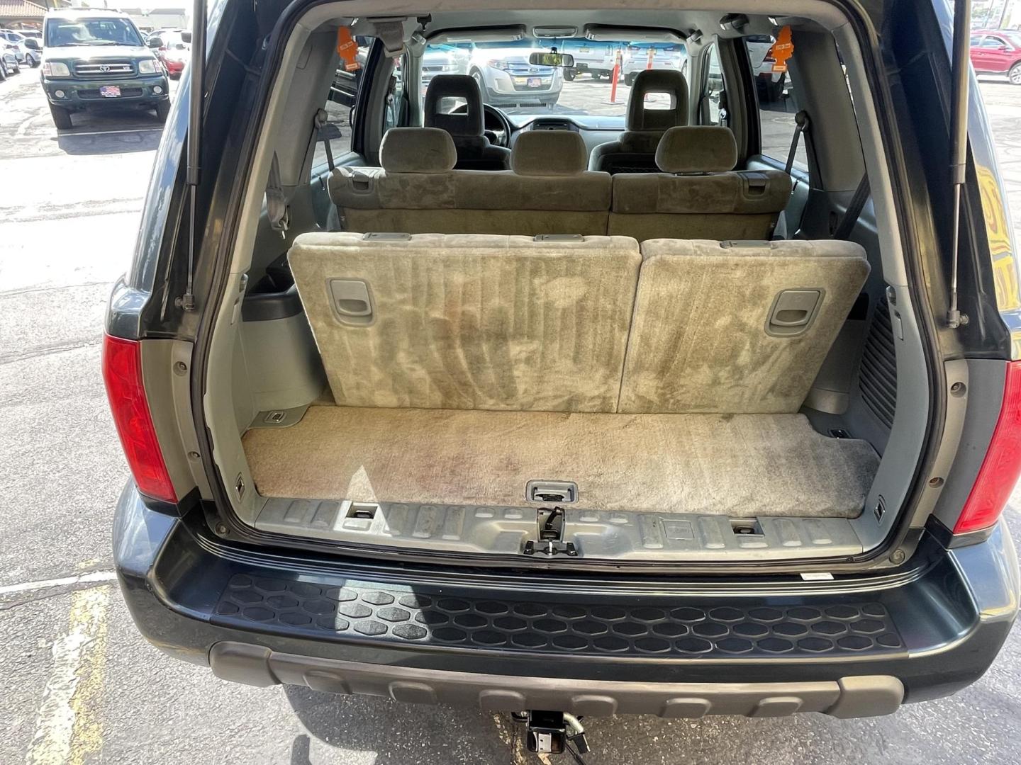 2003 Sagebrush Pearl /Gray Cloth Honda Pilot EX (2HKYF184X3H) with an 3.5L V6 engine, Automatic transmission, located at 801 South State Street, Salt Lake City, UT, 84111, (801) 328-0098, 40.751953, -111.888206 - 3rd row seating! 4x4! Clean title!!! Vehicle Features: EX Model, 3rd Rear Seat, 4WD-AWD, ABS Brakes, Air Conditioning, Alloy Wheels, AM-FM Stereo, Automatic Transmission, Cassette Player, CD Audio, Cloth Seats, Cruise Control, Fold-Away Third Row, Power Locks, Power Mirrors, Power Seat(s), Power W - Photo#19