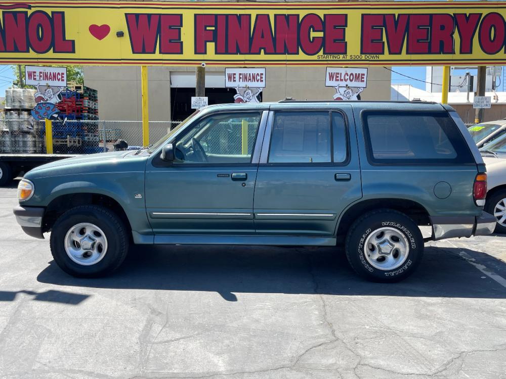 1997 Evergreen Frost Metallic /Tan Leather Ford Explorer XLT 5.0 (1FMDU35P3VZ) with an 5.0L V8 engine, Automatic transmission, located at 801 South State Street, Salt Lake City, UT, 84111, (801) 328-0098, 40.751953, -111.888206 - *MECHANIC SPECIAL! AS-IS!* BACK-LOT SPECIAL! This car just came in on trade and is being sold AS-IS. It may have mechanical or other cosmetic problems. It is being offered for sale to the public at a bargain price prior to it being sold at auction. The car has NOT been safety or emission tested nor - Photo #1