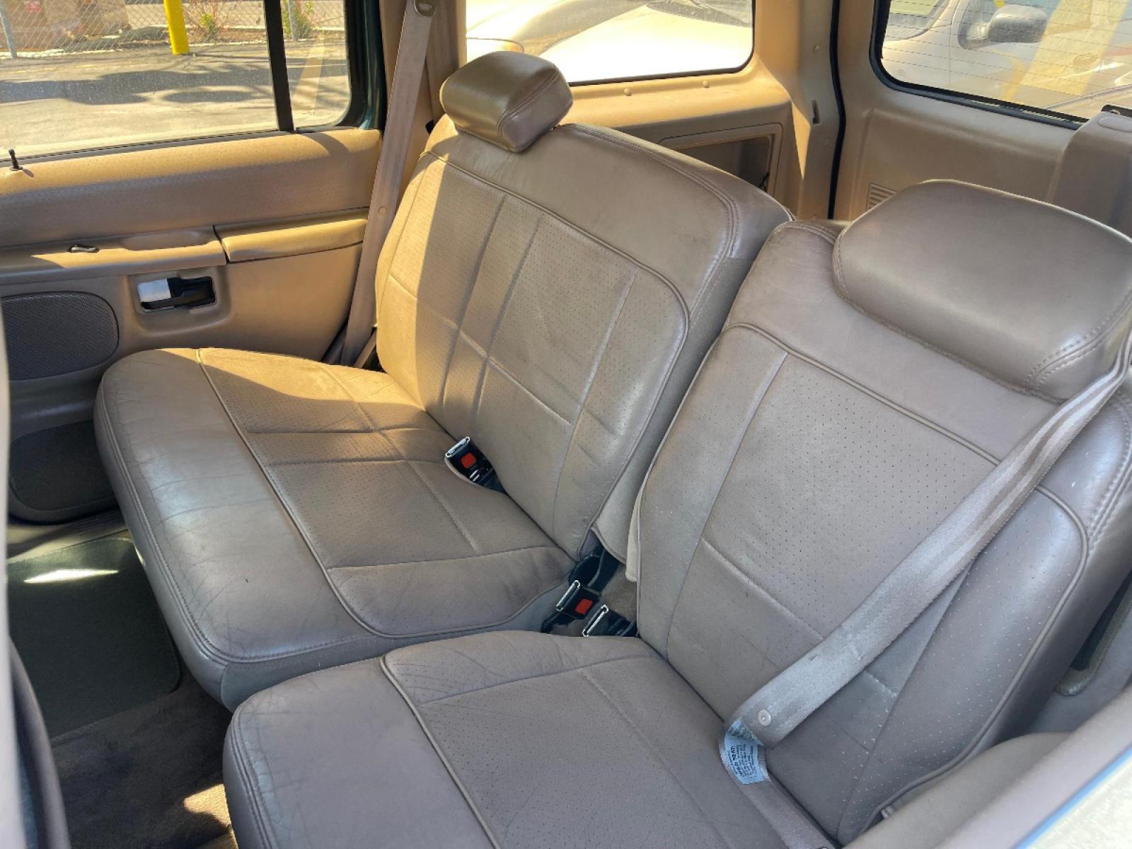 1997 Evergreen Frost Metallic /Tan Leather Ford Explorer XLT 5.0 (1FMDU35P3VZ) with an 5.0L V8 engine, Automatic transmission, located at 801 South State Street, Salt Lake City, UT, 84111, (801) 328-0098, 40.751953, -111.888206 - *MECHANIC SPECIAL! AS-IS!* BACK-LOT SPECIAL! This car just came in on trade and is being sold AS-IS. It may have mechanical or other cosmetic problems. It is being offered for sale to the public at a bargain price prior to it being sold at auction. The car has NOT been safety or emission tested nor - Photo #13