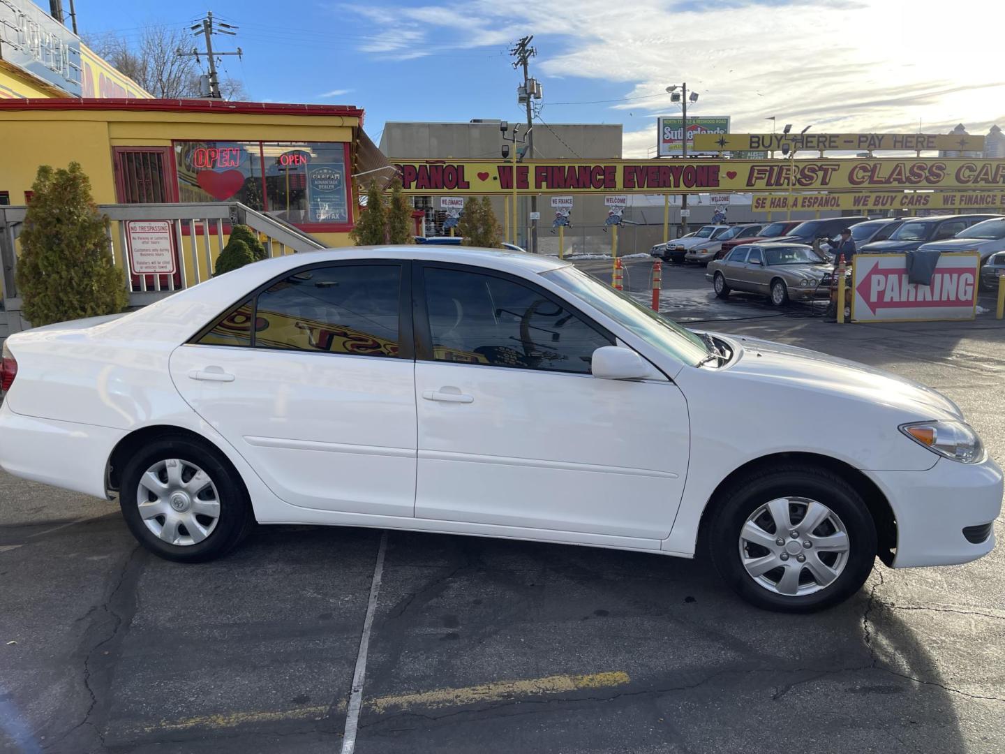 2005 Super White II /Gray Cloth Toyota Camry LE (4T1BE32K55U) with an 2.4L I4 engine, Automatic transmission, located at 801 South State Street, Salt Lake City, UT, 84111, (801) 328-0098, 40.751953, -111.888206 - Life is crazy. Now is the time to buy! All of our prices are just dollars above our cost. These prices will change as soon as life isn't so crazy. So please call or come in. We are here to save you a lot of money! Our service department is OPEN DAILY to help with any of your service needs. Please ca - Photo#4