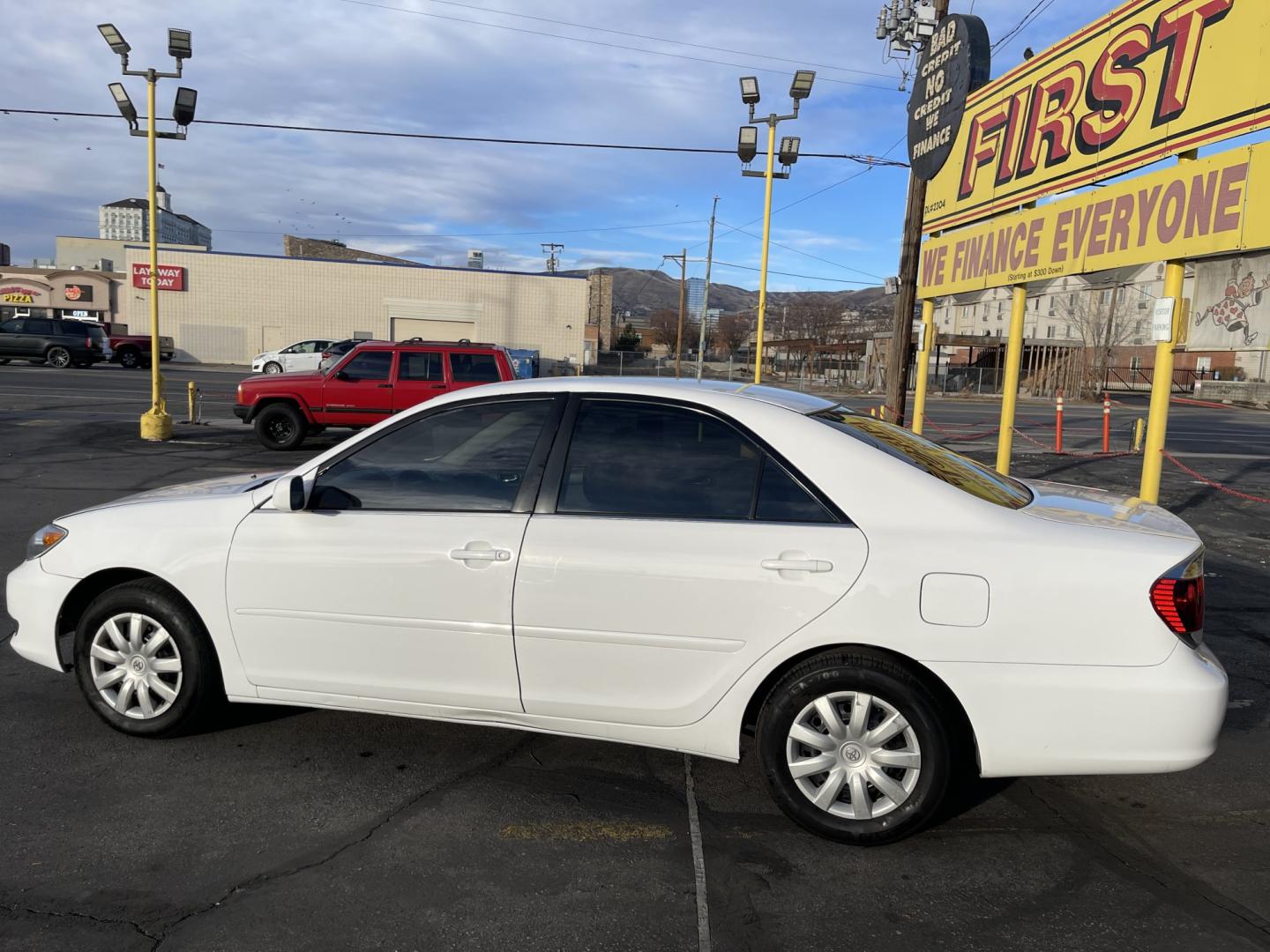 2005 Super White II /Gray Cloth Toyota Camry LE (4T1BE32K55U) with an 2.4L I4 engine, Automatic transmission, located at 801 South State Street, Salt Lake City, UT, 84111, (801) 328-0098, 40.751953, -111.888206 - Life is crazy. Now is the time to buy! All of our prices are just dollars above our cost. These prices will change as soon as life isn't so crazy. So please call or come in. We are here to save you a lot of money! Our service department is OPEN DAILY to help with any of your service needs. Please ca- Photo#8