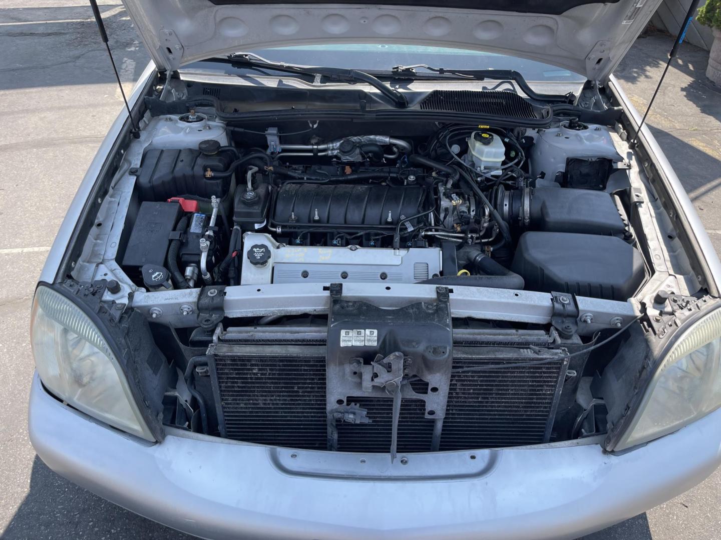 2003 Galaxy Silver Metallic /Gray Leather Cadillac Deville (1G6KD54Y13U) with an 4.6L V8 engine, Automatic transmission, located at 801 South State Street, Salt Lake City, UT, 84111, (801) 328-0098, 40.751953, -111.888206 - Clean Title!! Extra clean!! Immaculate condition!! Free Carfax!! Must see!! Warranty available!! Free Carfax!!! Vehicle Features: Alloy Wheels, AM-FM Radio, CD Player, Cruise Control, Leather Interior, Power Locks, Power Mirrors, Power Seats, Power Steering, Power Windows, Rear Window Defroster - Photo#16