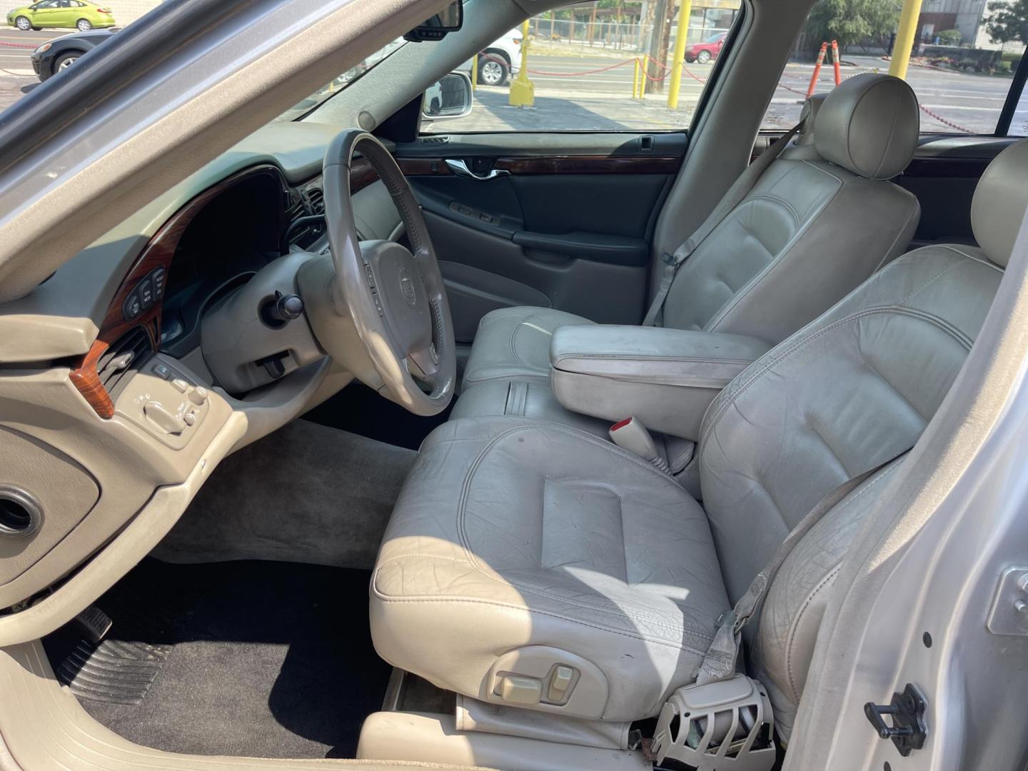 2003 Galaxy Silver Metallic /Gray Leather Cadillac Deville (1G6KD54Y13U) with an 4.6L V8 engine, Automatic transmission, located at 801 South State Street, Salt Lake City, UT, 84111, (801) 328-0098, 40.751953, -111.888206 - Clean Title!! Extra clean!! Immaculate condition!! Free Carfax!! Must see!! Warranty available!! Free Carfax!!! Vehicle Features: Alloy Wheels, AM-FM Radio, CD Player, Cruise Control, Leather Interior, Power Locks, Power Mirrors, Power Seats, Power Steering, Power Windows, Rear Window Defroster - Photo#9