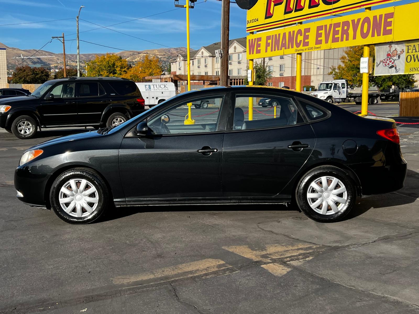 2008 Black Pearl /Gray Cloth Hyundai Elantra GLS (KMHDU46D98U) with an 2.0L I4 engine, Automatic transmission, located at 801 South State Street, Salt Lake City, UT, 84111, (801) 328-0098, 40.751953, -111.888206 - Life is crazy. Now is the time to buy! All of our prices are just dollars above our cost. These prices will change as soon as life isn't so crazy. So please call or come in. We are here to save you a lot of money! Our service department is OPEN DAILY to help with any of your service needs. P - Photo #1