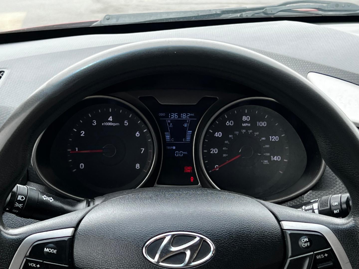 2013 Boston Red Pearl /Gray Cloth Hyundai Veloster (KMHTC6AD4DU) with an 1.6L I4 engine, Manual transmission, located at 801 South State Street, Salt Lake City, UT, 84111, (801) 328-0098, 40.751953, -111.888206 - Our service department is OPEN DAILY to help with any of your service needs. Please call for immediate appointment! Clean Title!! Extra clean!! Immaculate condition!! Free Carfax!! Must see!! Warranty available!! Free Carfax!!! Vehicle Features:ABS Brakes, Air Conditioning, Alloy Wheels, AM-FM - Photo#17
