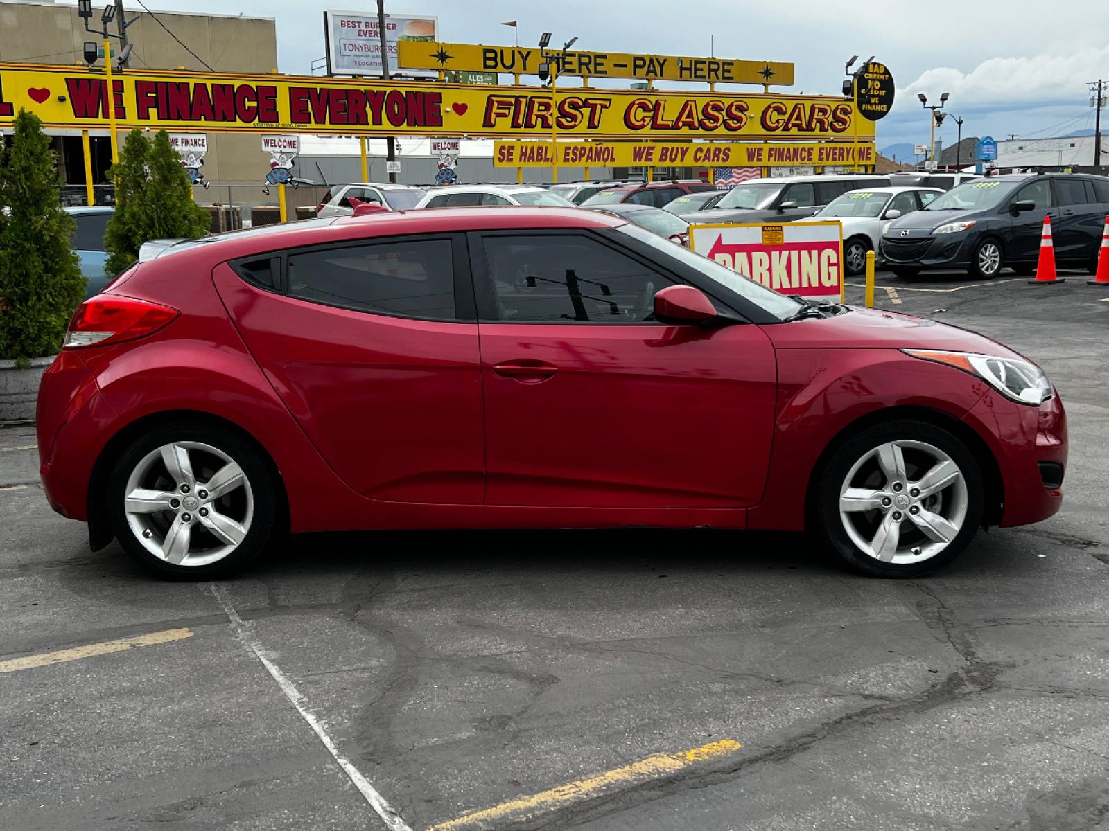 2013 Boston Red Pearl /Gray Cloth Hyundai Veloster (KMHTC6AD4DU) with an 1.6L I4 engine, Manual transmission, located at 801 South State Street, Salt Lake City, UT, 84111, (801) 328-0098, 40.751953, -111.888206 - Life is crazy. Now is the time to buy! All of our prices are just dollars above our cost. These prices will change as soon as life isn't so crazy. So please call or come in. We are here to save you a lot of money! Our service department is OPEN DAILY to help with any of your service needs. P - Photo #5